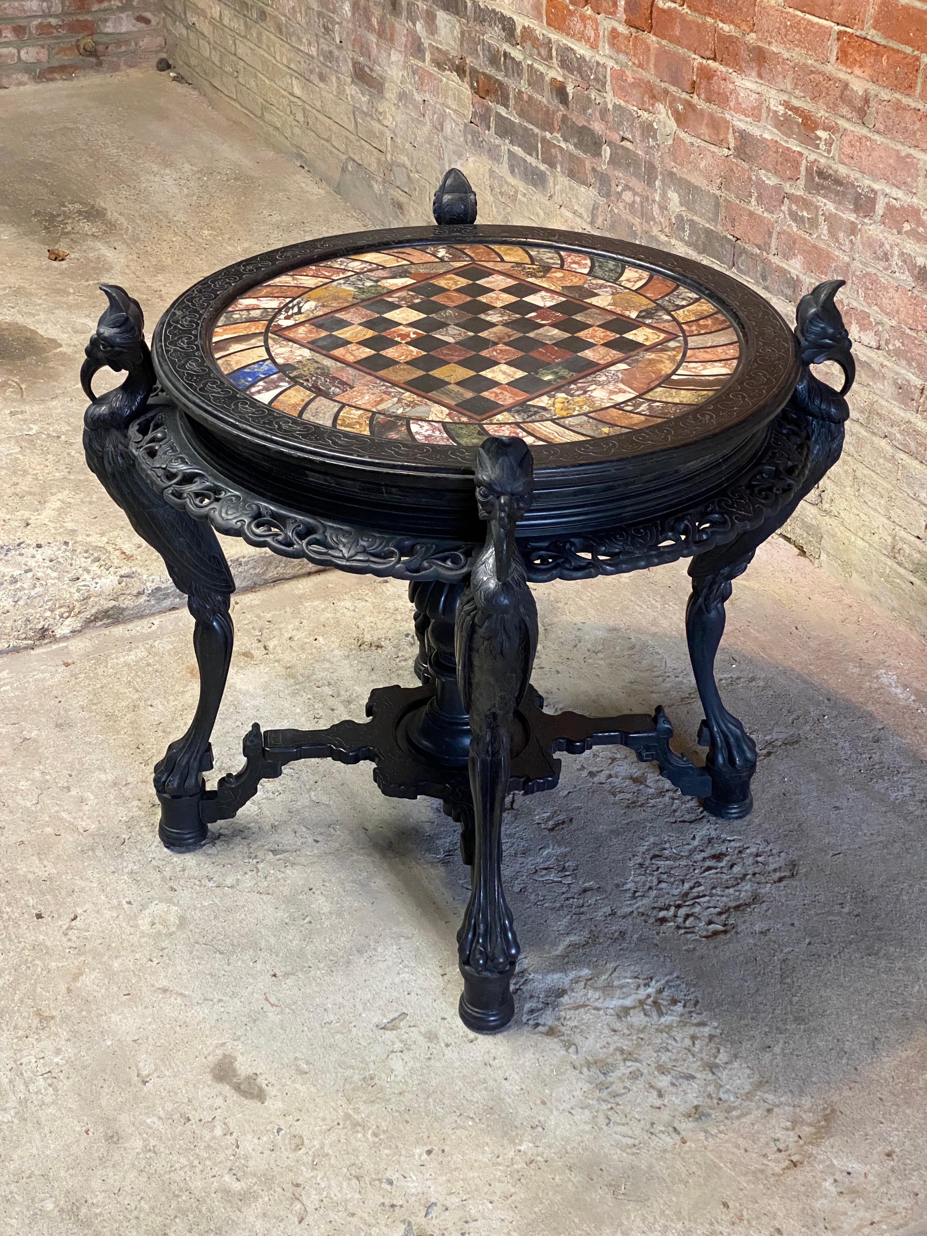 Unknown Aesthetic Movement Ebonized Griffin Specimen Top Chess Table For Sale