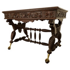 Table de bibliothèque sculptée en noyer des frères Merklen, style Mouvement esthétique, New York, 1890
