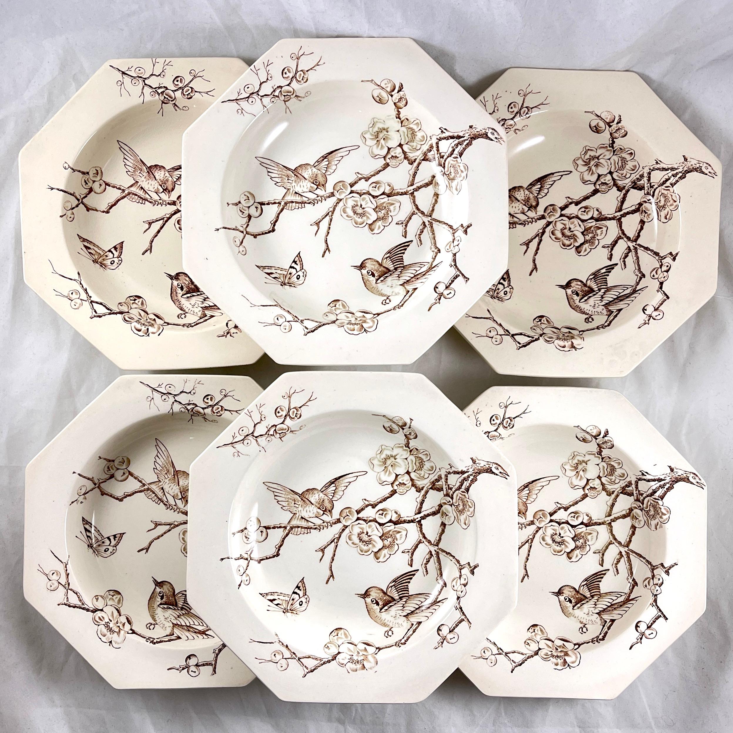 From Moore & Company – Old Foley Pottery, a set of six soup plates, Longton, Stoke-on-Trent, England, circa 1886.

The set of six octagonal shaped deep plates show a pattern in the aesthetic taste. Birds, butterflies, and Dogwood branches are