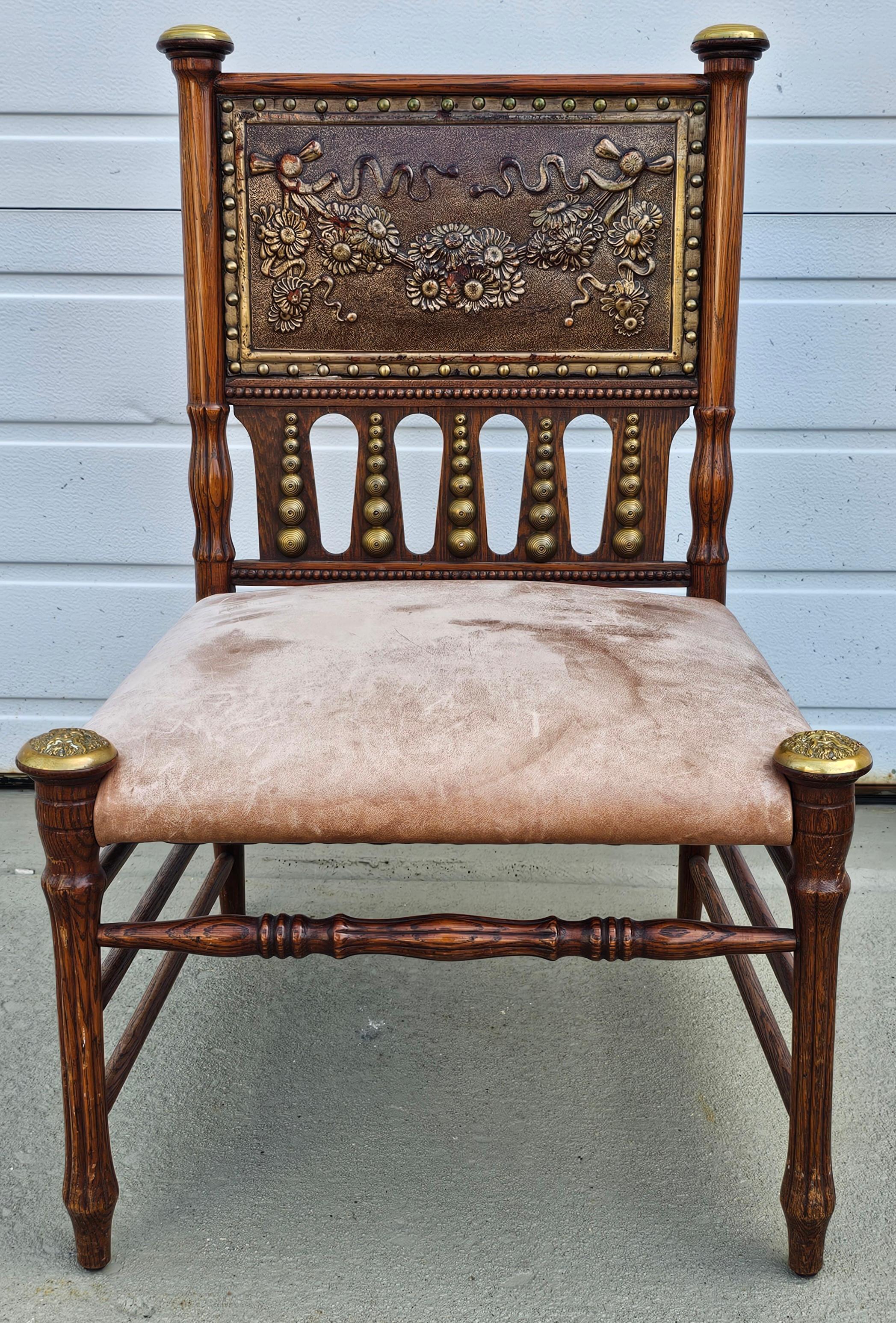 An Aesthetic Movement Oak and Brass with Pressed Leather Back Slipper Chair
Measures 22 