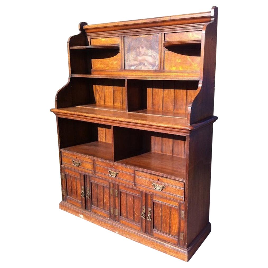 Aesthetic Movement Oak Bookcase Sideboard with a Pre Raphaelite Oil Painting