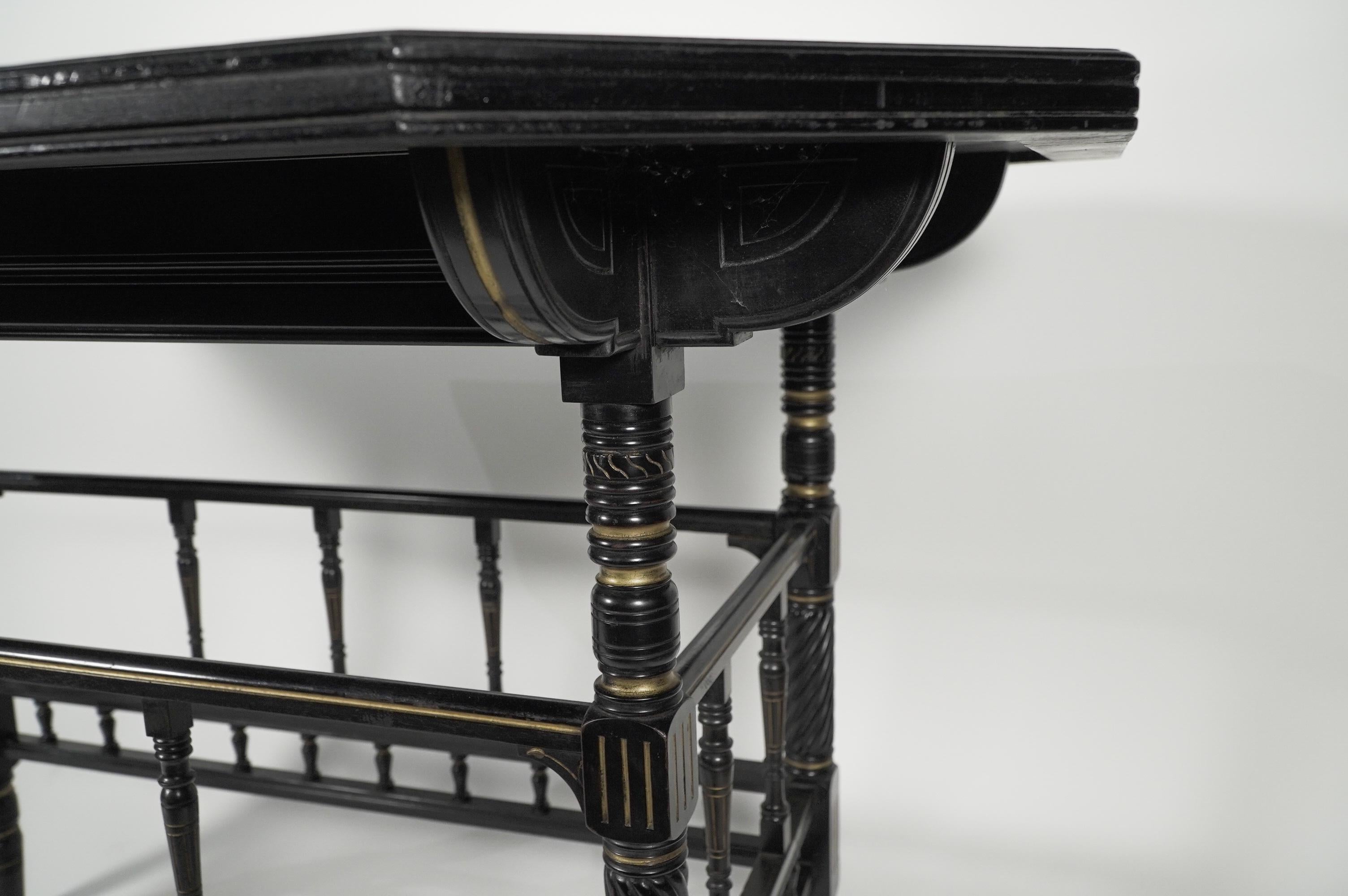Gillows attri An Aesthetic Movement oblong ebonized & Gilded walnut centre table For Sale 3
