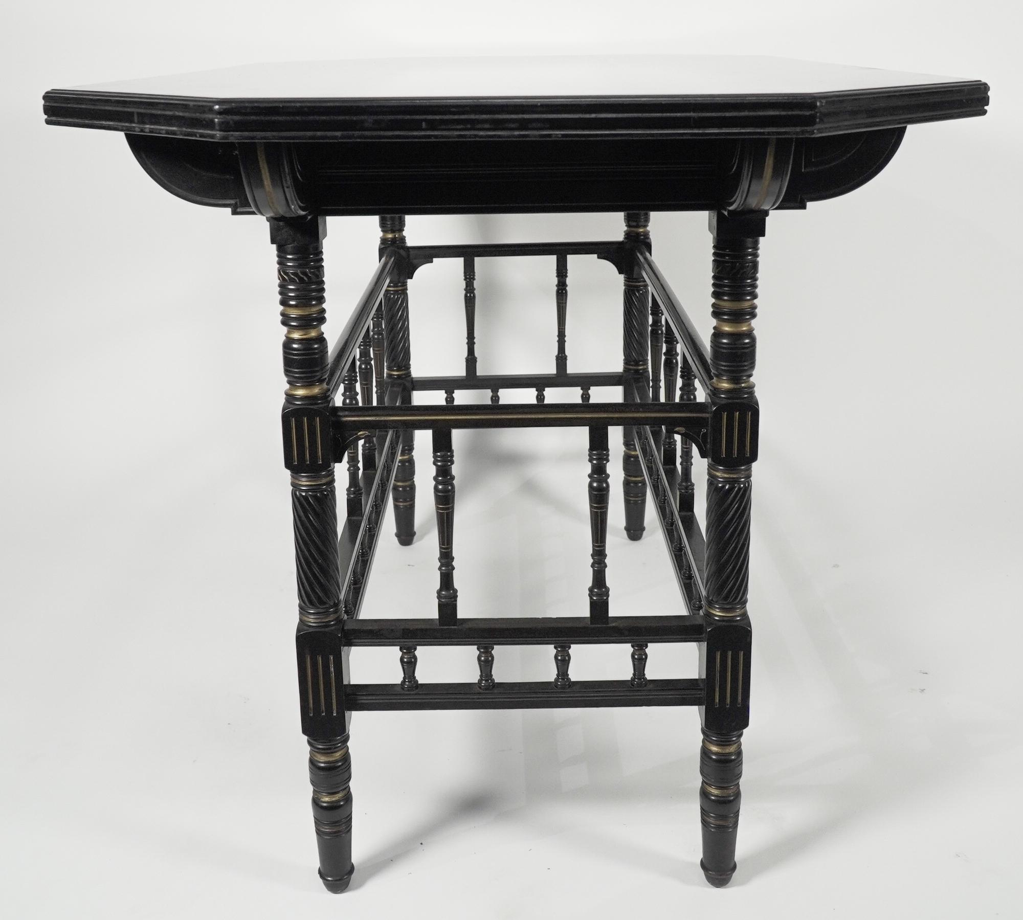 English Gillows attri An Aesthetic Movement oblong ebonized & Gilded walnut centre table For Sale