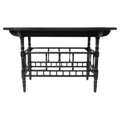 Gillows attri An Aesthetic Movement oblong ebonized & Gilded walnut centre table