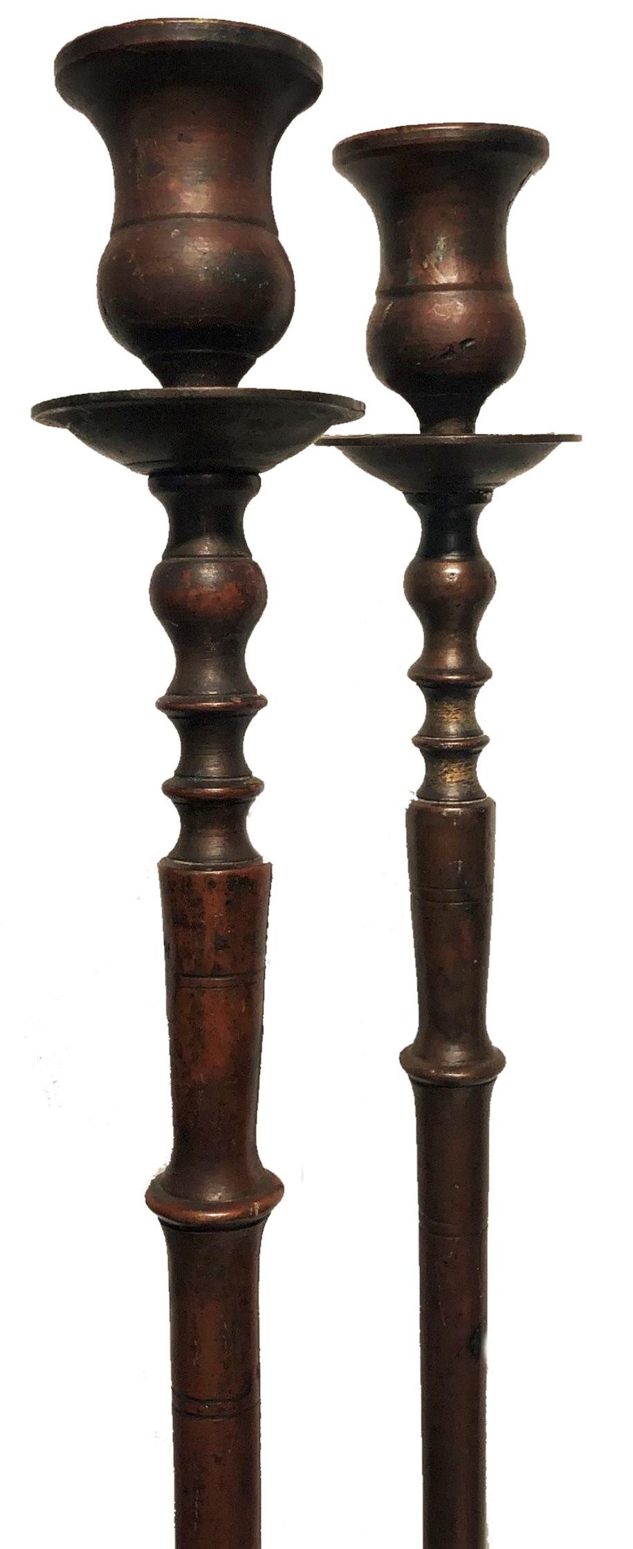 American Aesthetic Movement 
Pair of Bronze Candlesticks 
in Manner of Tiffany
ca. 1880s

DIMENSIONS
Height: 18.25 inches
Width: 3.25 inches
Depth: 3.25 inches

ABOUT
This elegant pair of tall, graceful, perfectly shaped bronze candle holders are