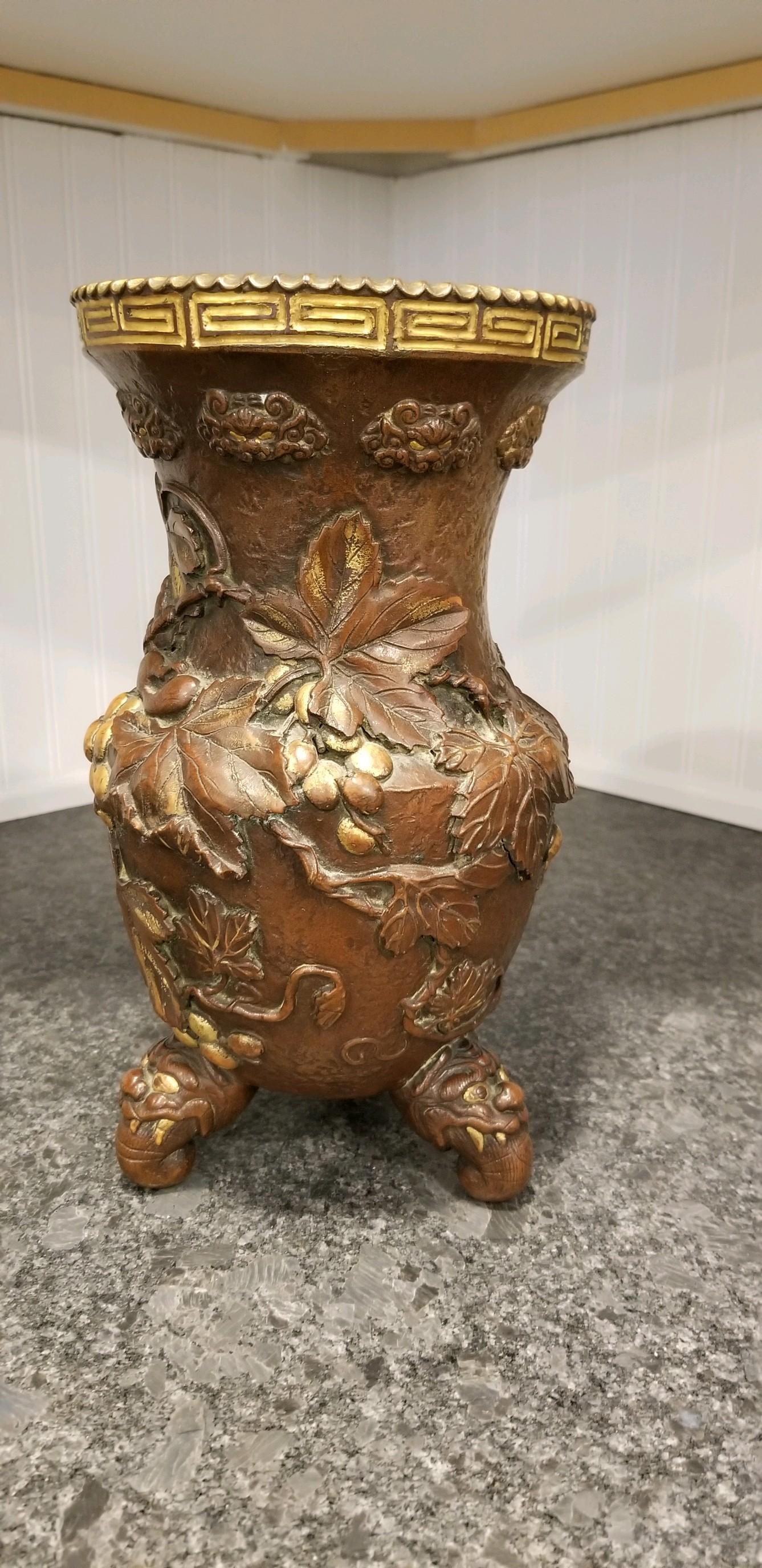 Aesthetic Movement pottery vase is a rare find. Finished to look like bronze is has all the right elements to make it a wow piece. It is Chinese as per the markings. It is in good condition as for the age. Please inspect the photos for all the