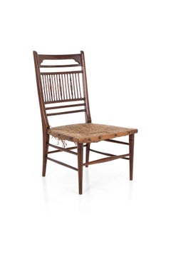 Silla auxiliar Aesthetic Movement de nogal por E.W. Godwin, hacia 1885