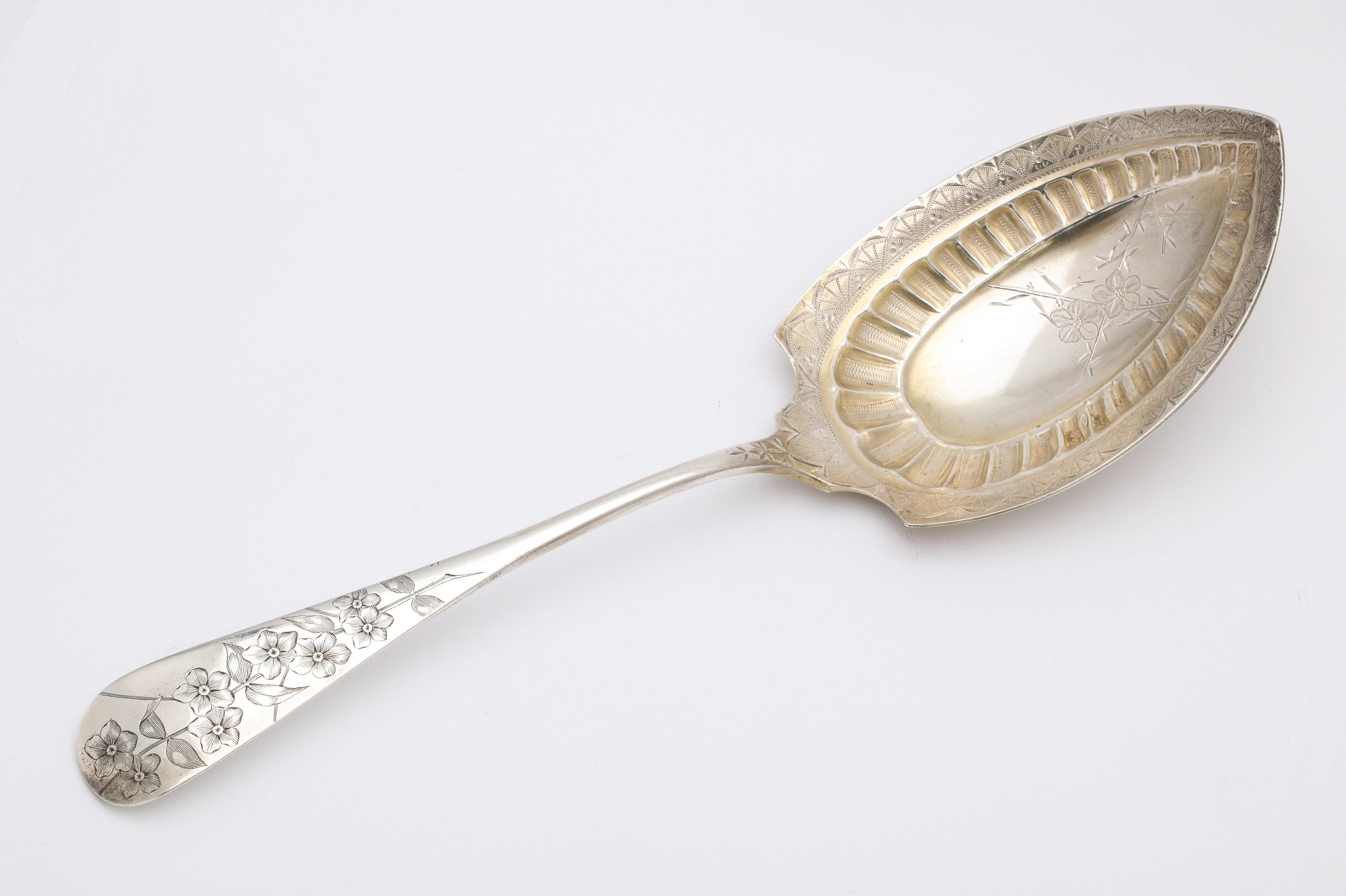 American Aesthetic Movement Sterling Silver Parcel Gilt Serving Spoon - J.E. Caldwell For Sale