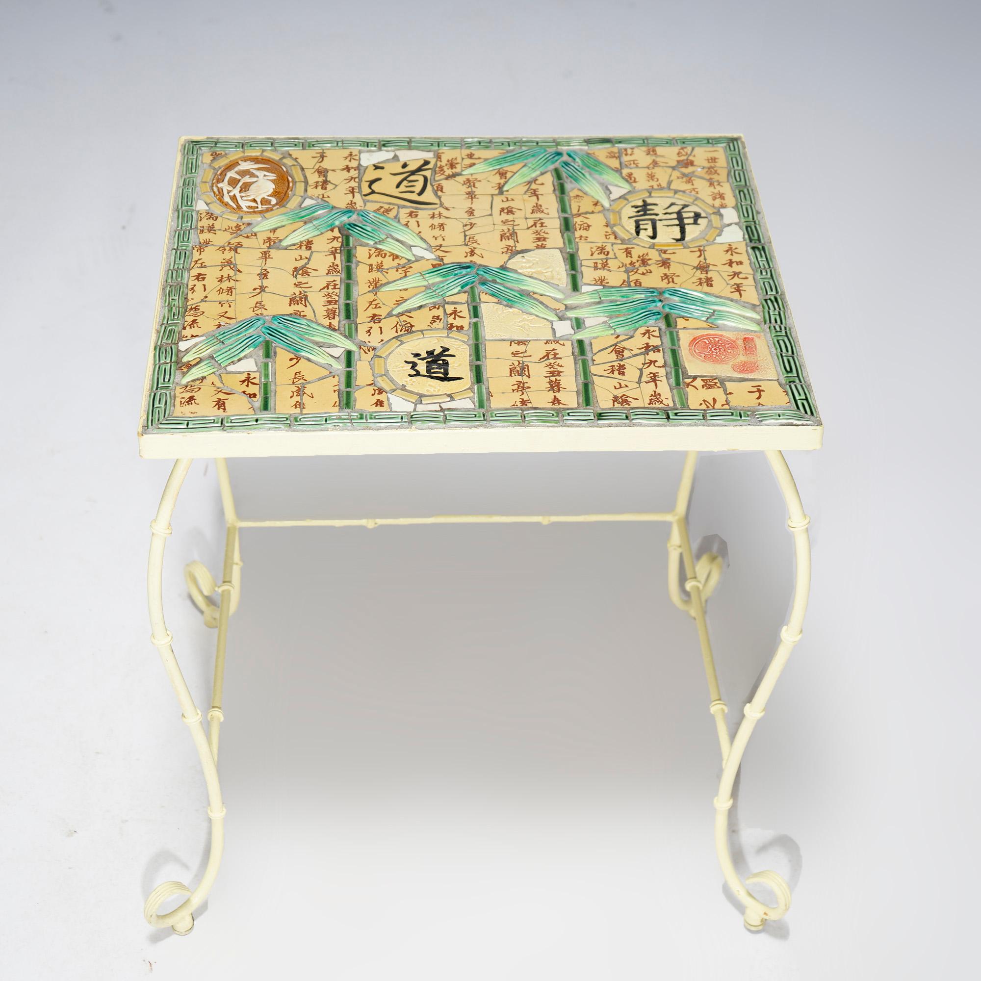 A vintage garden table in the style of the Aesthetic Movement offers ceramic tile top with Asian foliage including bamboo and characters over cast metal base having bamboo form frame, 20th century

Measures - 25.5'' H x 21.5'' W x 18.5''