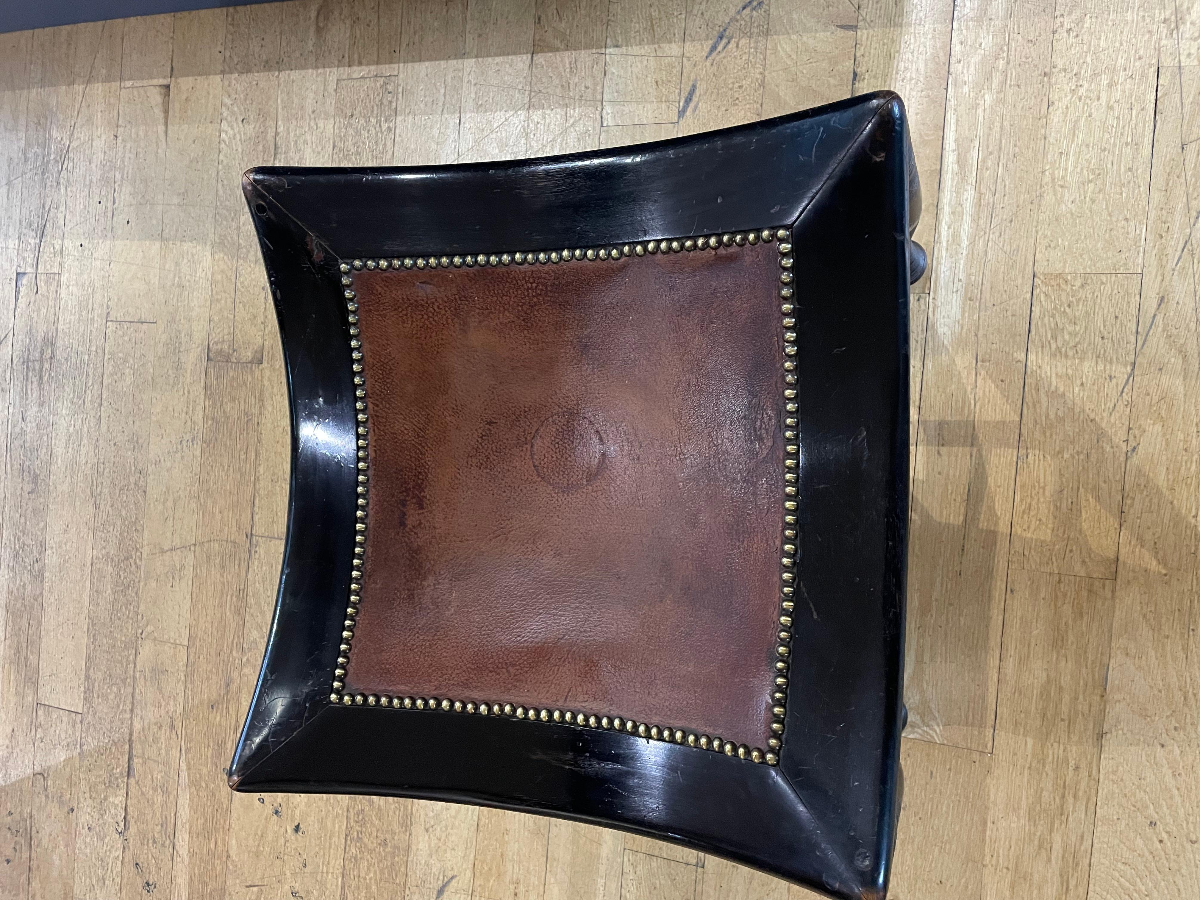 Rare Aesthetic Movement ebonised 'Thebes' stool with contrasting struts to simulate ebony and ivory

Original leather seat

Circa 1885

Liberty & Co

Illustrated in Liberty’s Furniture by Daryl Bennett P96 Figure No 4.15

Liberty & Co Art Furniture