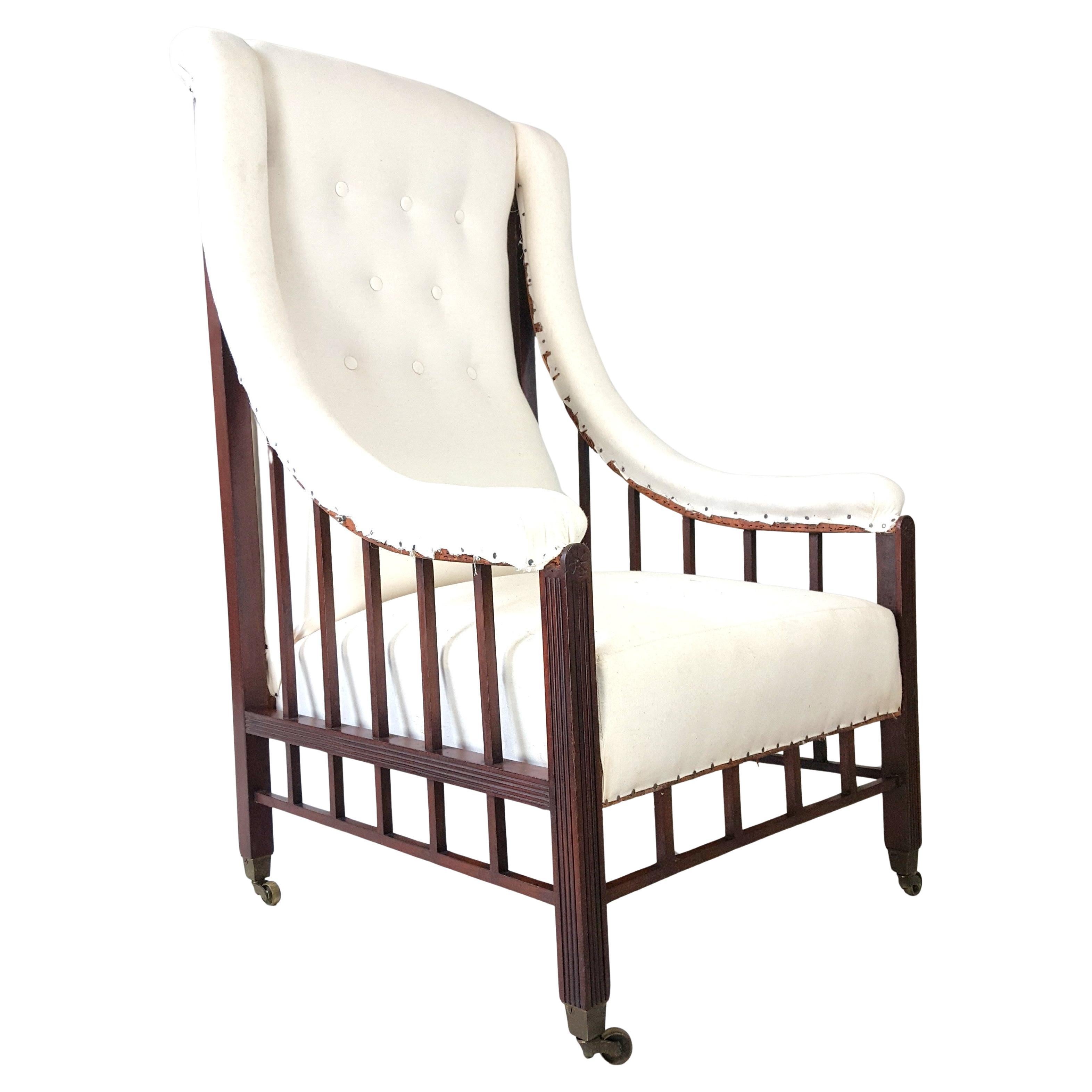 Aesthetic Movement upholstered mahogany armchair