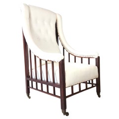 Aesthetic Movement upholstered mahogany armchair
