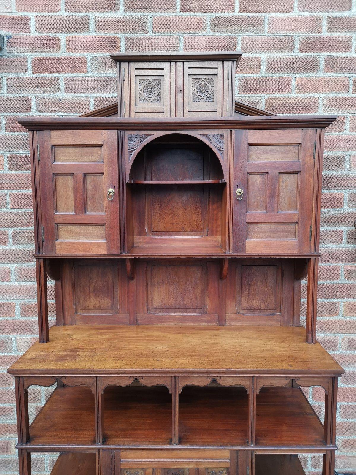 Hand-Carved Aesthetic Movement Walnut Cabinet of Architectural Form with Carved Decoration. For Sale
