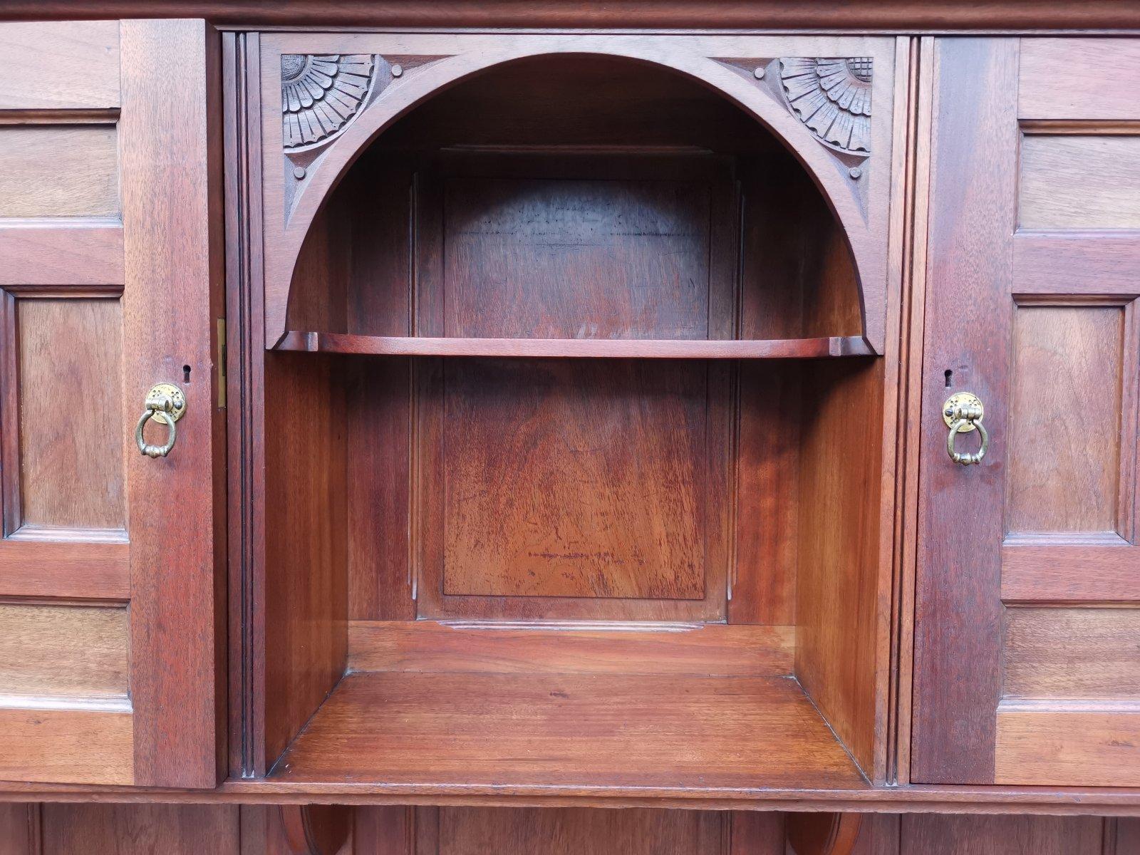 Aesthetic Movement Walnut Cabinet of Architectural Form with Carved Decoration. For Sale 2