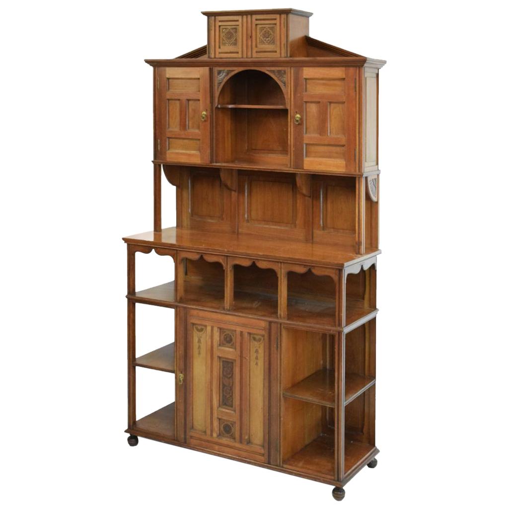 Aesthetic Movement Walnut Cabinet of Architectural Form with Carved Decoration. For Sale