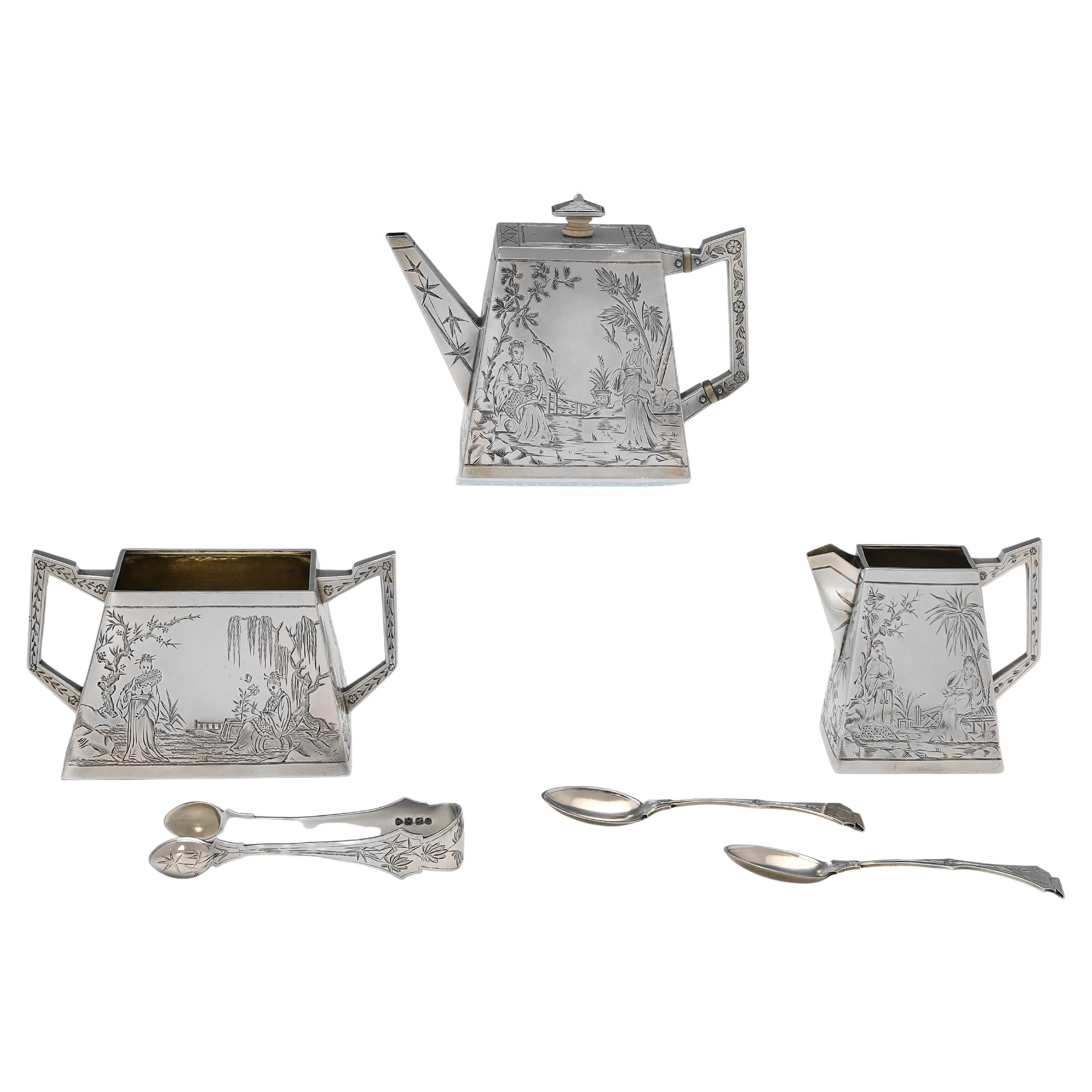 Hallmarked in London in 1876 by Edward Charles Brown, this incredible, Victorian, Antique Sterling Silver 3 Piece Tea Set, is in the Aesthetic taste, with stunning engraved decoration to each piece, and is presented in it's original box. In total