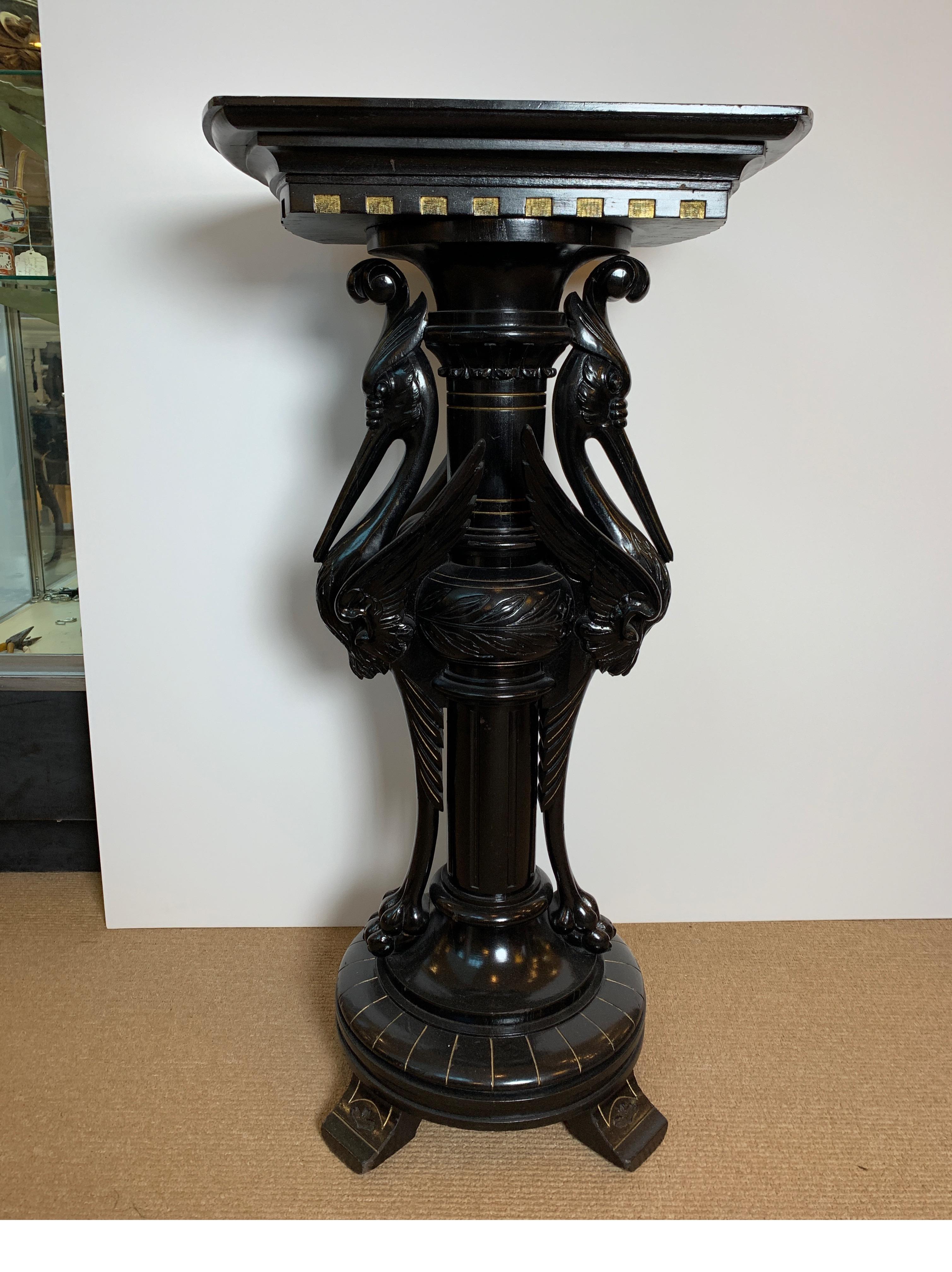 Aesthetic Movement double crane pedestal, ebonized wood with gold accents. Beautifully hand carved and ebonized with the original finish.