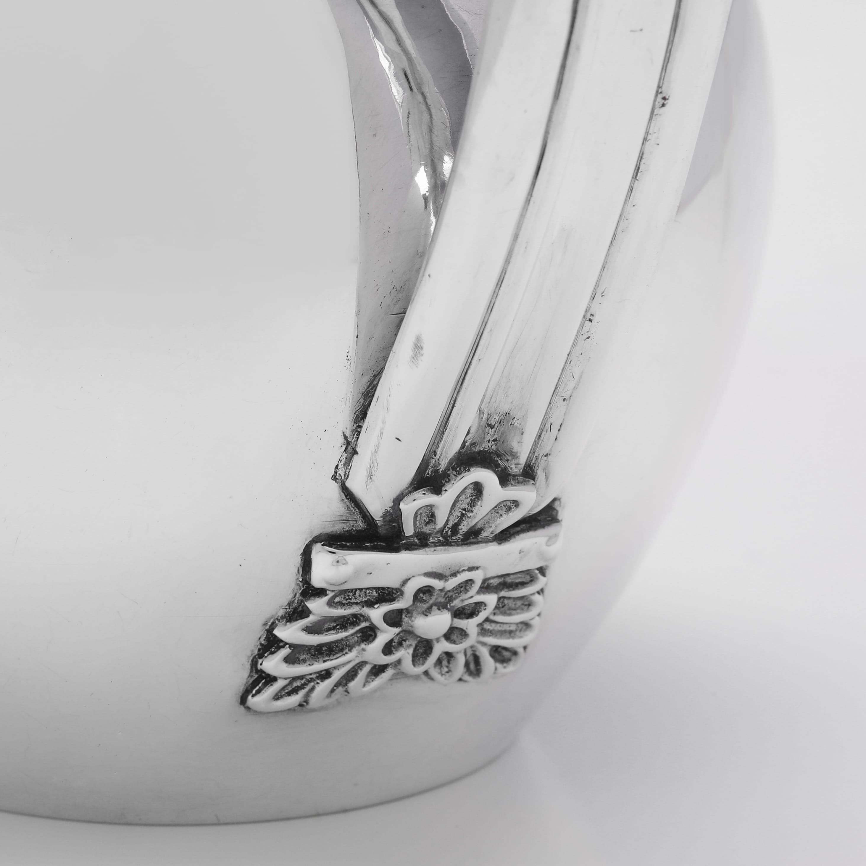 English Aesthetic period sterling silver water jug and beaker set made in London in 1889 For Sale