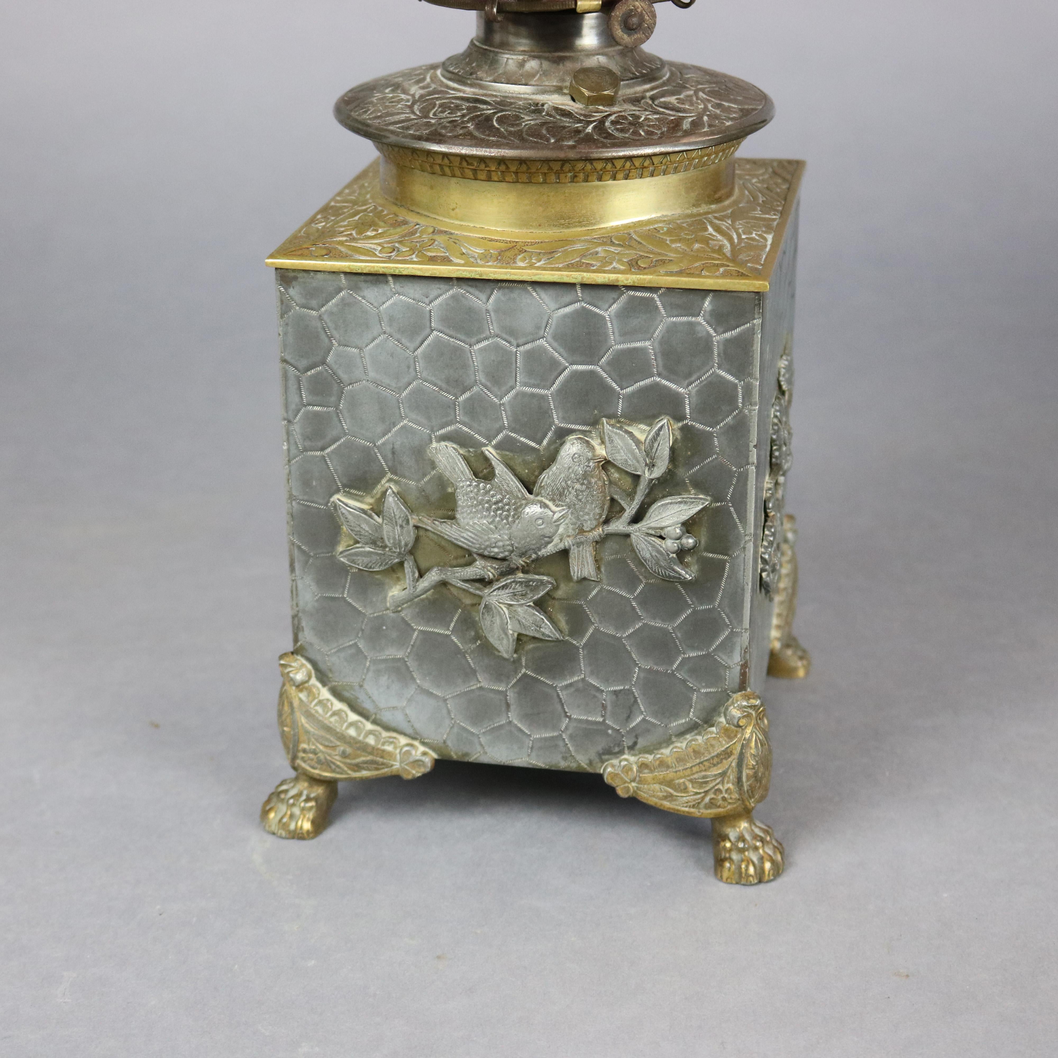American Aesthetic Silver & Gilt Metal Oil Lamp, Cranberry Swirl Glass Shade, circa 1870