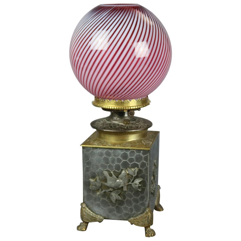 Aesthetic Silver and Gilt Metal Oil Lamp, Cranberry Swirl Glass Shade,  circa 1870 at 1stDibs