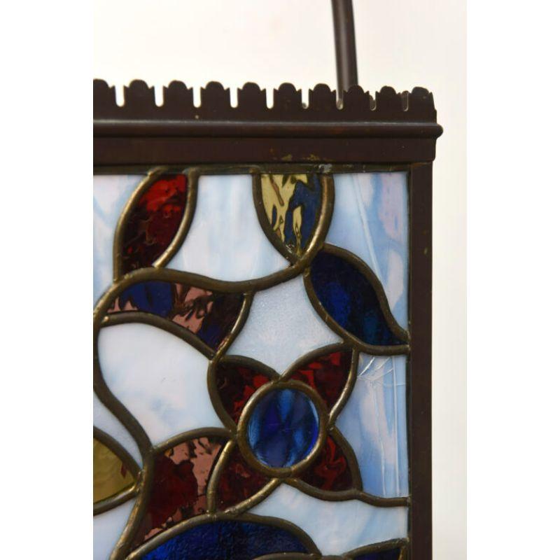 Stained glass harp lantern. Originally Gas. Completely restored and rewired, ready to hang. American C. 1885

Dimensions: 
height: 33
width (diameter): 9.