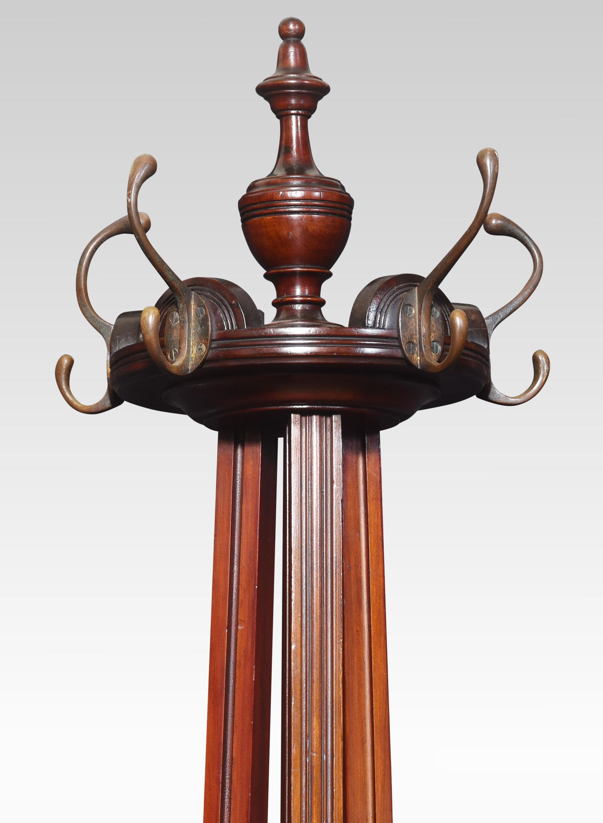 Aesthetic walnut hat and coat stand, the turned finial with four revolving hooks on three reeded stems. The base fitted with three splayed legs united by circular under tier.
Dimensions
Height 81.5 Inches
Width 25.5 Inches
Depth 25.5 Inches