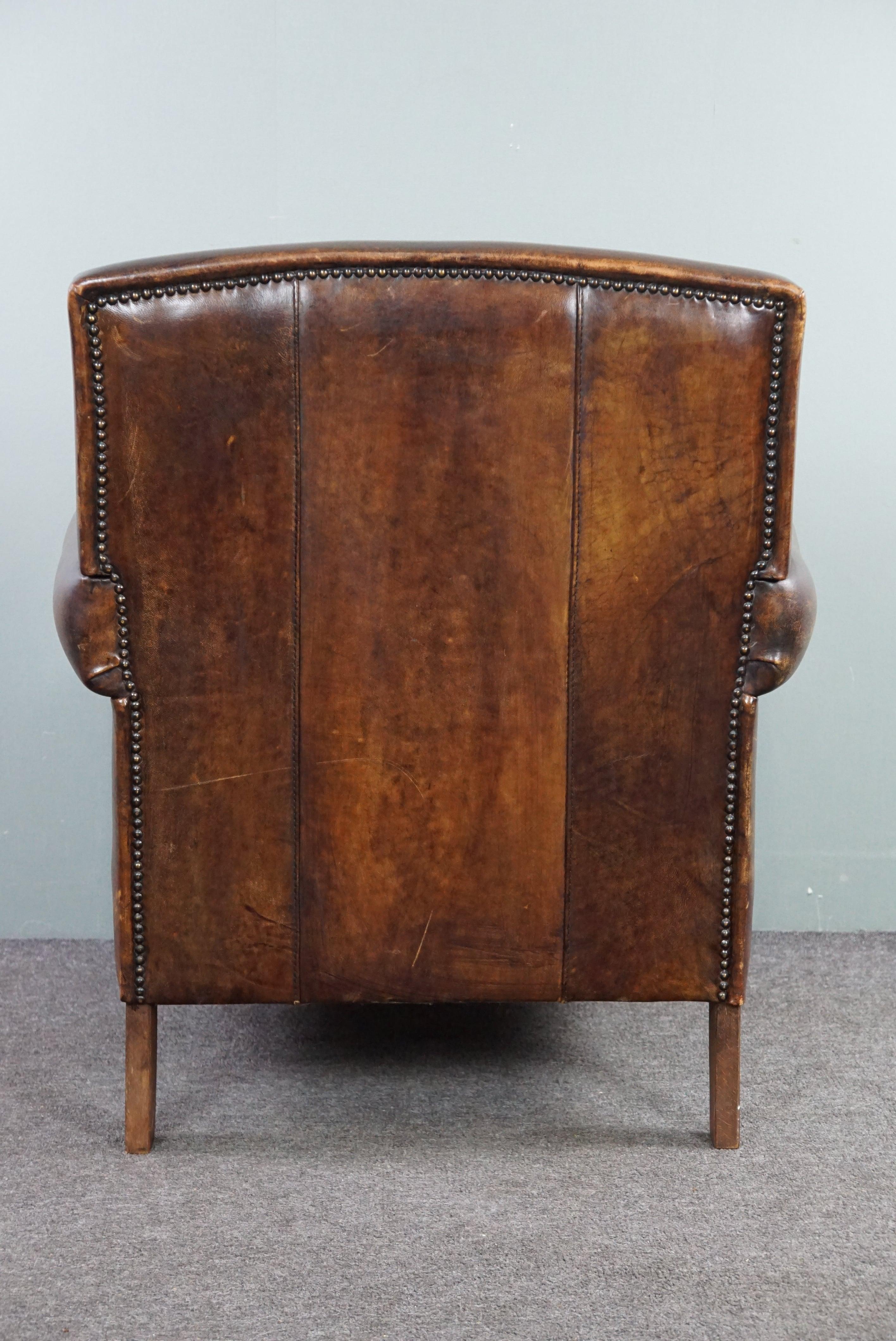 Hand-Crafted Aesthetically well thought out sheepskin armchair/armchair For Sale