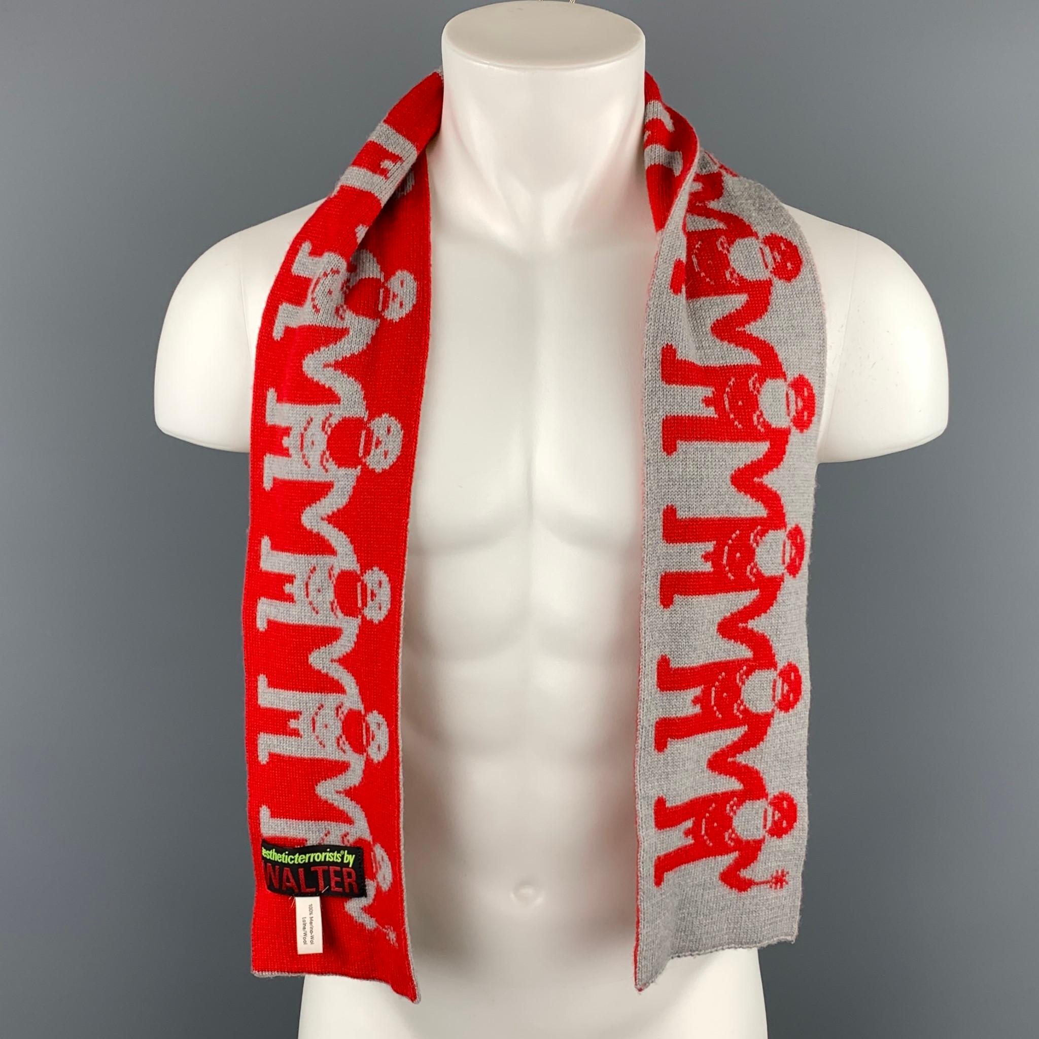 AESTHETICTERRORISTS by WALTER VAN BEIRENDONCK scarf comes in a red & grey print merino wool. 

Very Good Pre-Owned Condition.

Measurements: 54 in. x 6 in. 