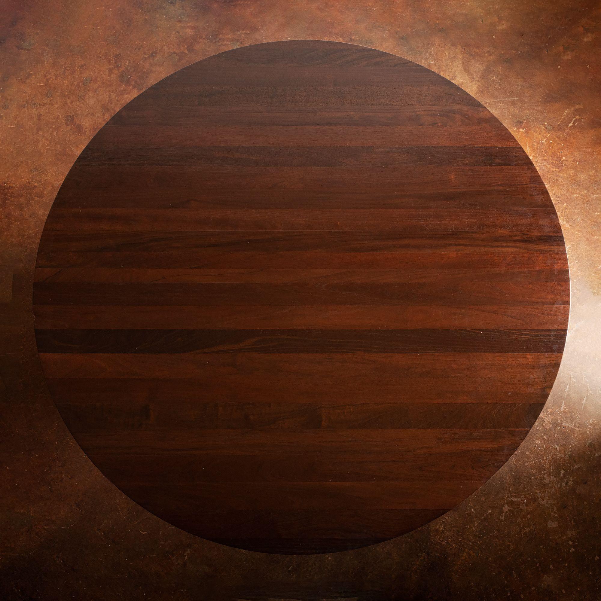 A handsome, solid walnut finish dining table by Aeterna.