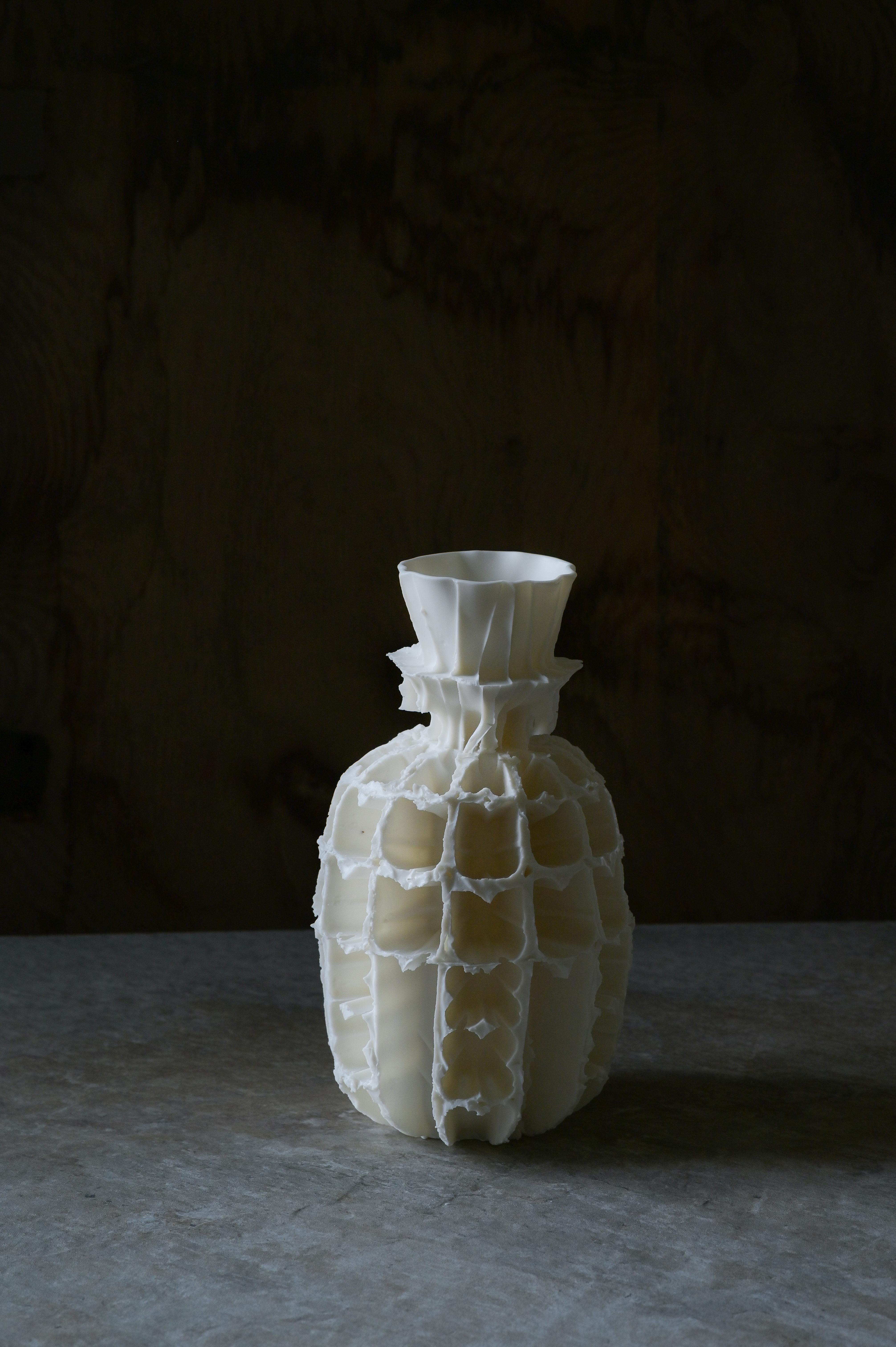 Aethra Siderea Series Sculpture by Zsolt József Simon
Dimensions: W 15 x D 15 x H 25 cm
Materials: Porcelain.

Zsolt József Simon is a porcelain designer based in Pécs, Hungary. Most of their works are sculptural pieces inspired by ancient art and
