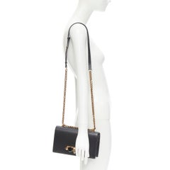 A:EXANDER MCQUEEN Knuckle Duster gold Skull jewel black gold chain  bag