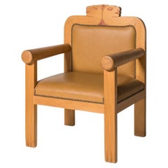 Fauteuil marron d'Alessandro Fassianos