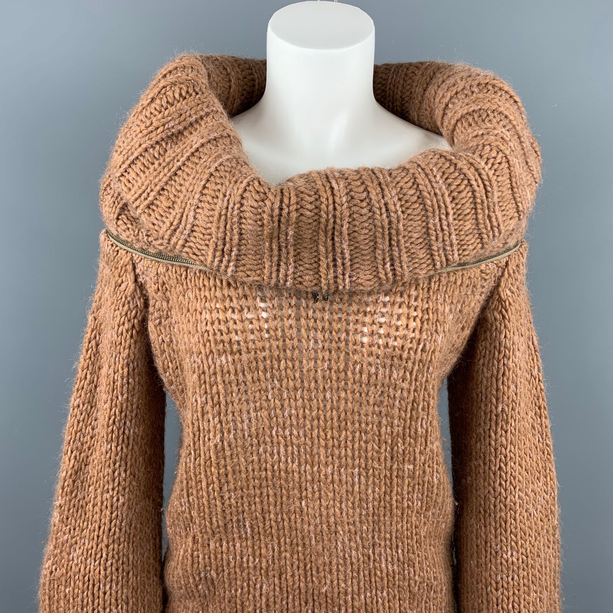 A.F. VANDERVORST sweater comes in a camel mohair blend featuring a cowl neck, red embroidered cross, and a zipper detail. Made in Belgium.

Very Good Pre-Owned Condition.
Marked: S

Measurements:

Shoulder: 17 in.
Bust: 40 in.
Sleeve: 25 in.
Length: