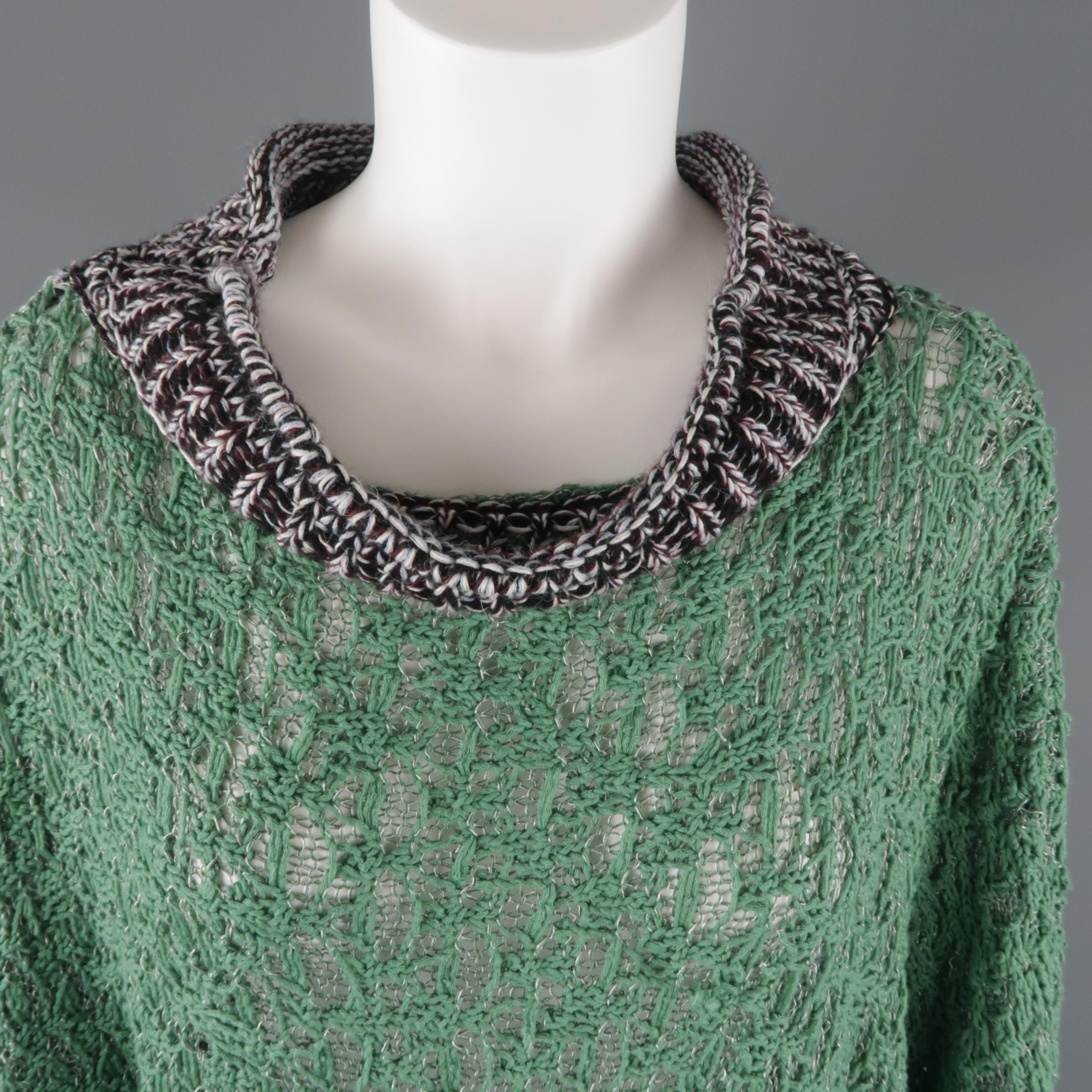AF VANDERFROST pullover sweater comes in a green mesh knit with batwing sleeves and black, white , and burgundy textured knit trims. No tag. Made in Belgium.
 
Good Pre-Owned Condition.
Marked: S
 
Measurements:
 
Shoulder: 22 in.
Bust: 60