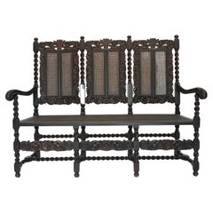 Antique English Jacobean Style Carved Oak Caned Seat and Back Settee Circa 1890