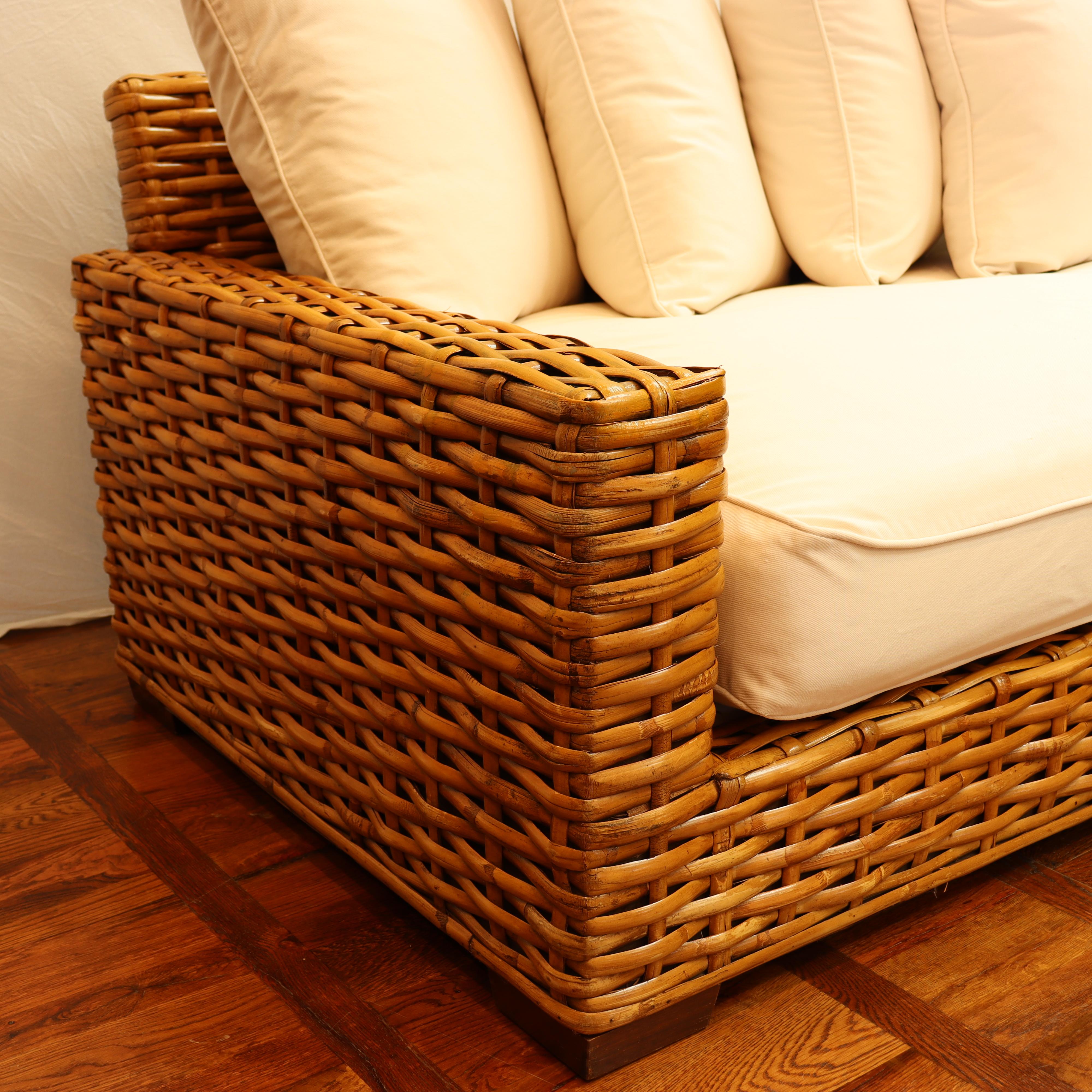 Restoration Hardware Woven Rattan Sofa w/ White Upholstery  Circa 2007  In Good Condition For Sale In Los Angeles, CA