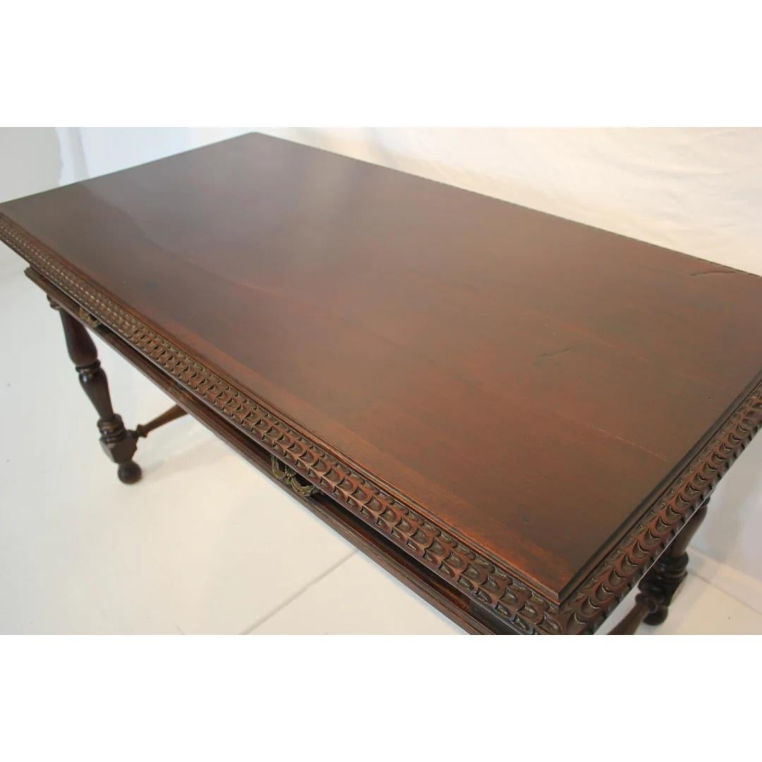 Hand-Carved Antique Spanish Colonial Revival Desk with Iron Stretcher Bars Circa 1900 For Sale