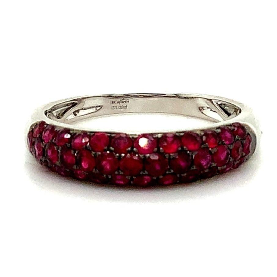 Afarin Collection 3 Row Domed Graduating Pavé Ruby band Set in 18K White Gold and finished
with Black Rhodium, this ring features Vibrant  Rubies that Graduate in size. 
37 Round Brilliant Cut Natural Rubies =1.09 cts 
The Diameter is 4.52 x