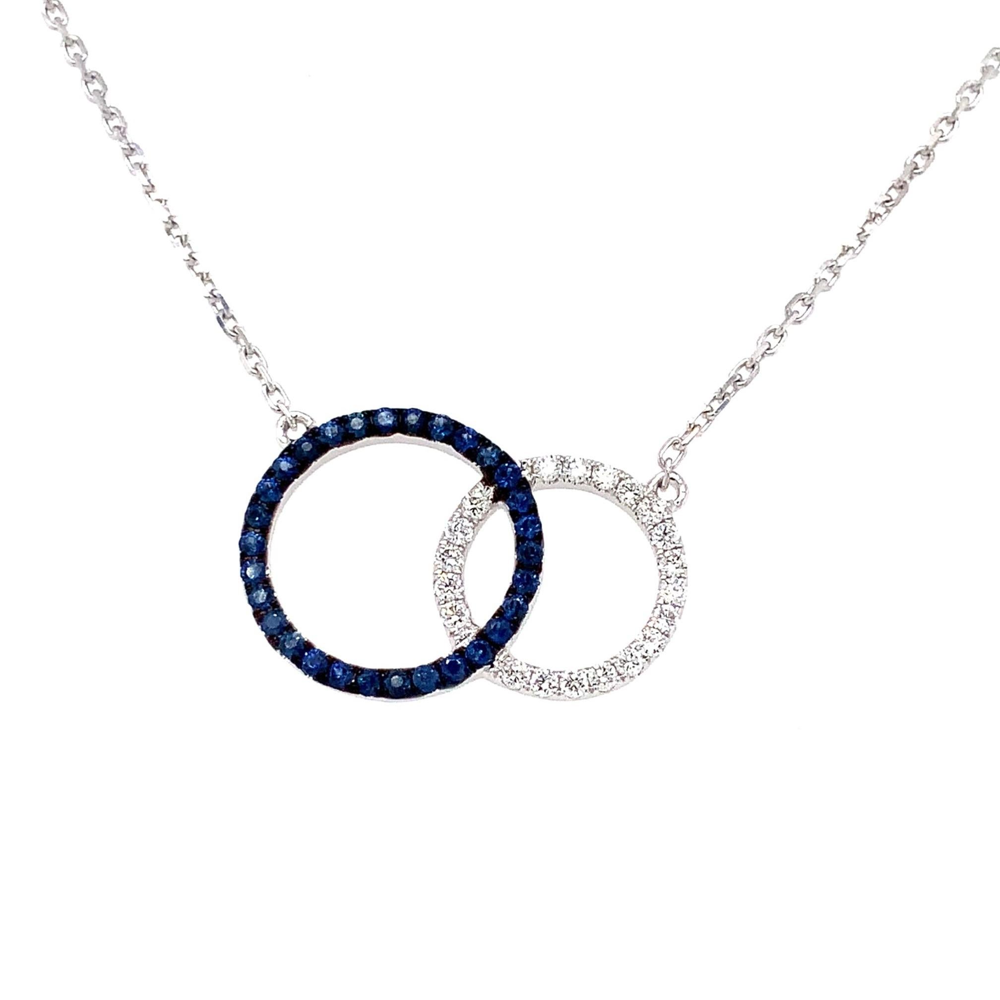 Afarin Collection Love Knot Blue Sapphire and Diamond Necklace Set in 18K White Gold.
20 Round Brilliant Cut Diamond = 0.18 tw.
30 Round Sapphire =0.29 tw
20 x 13.40 x 11.21 mm
18