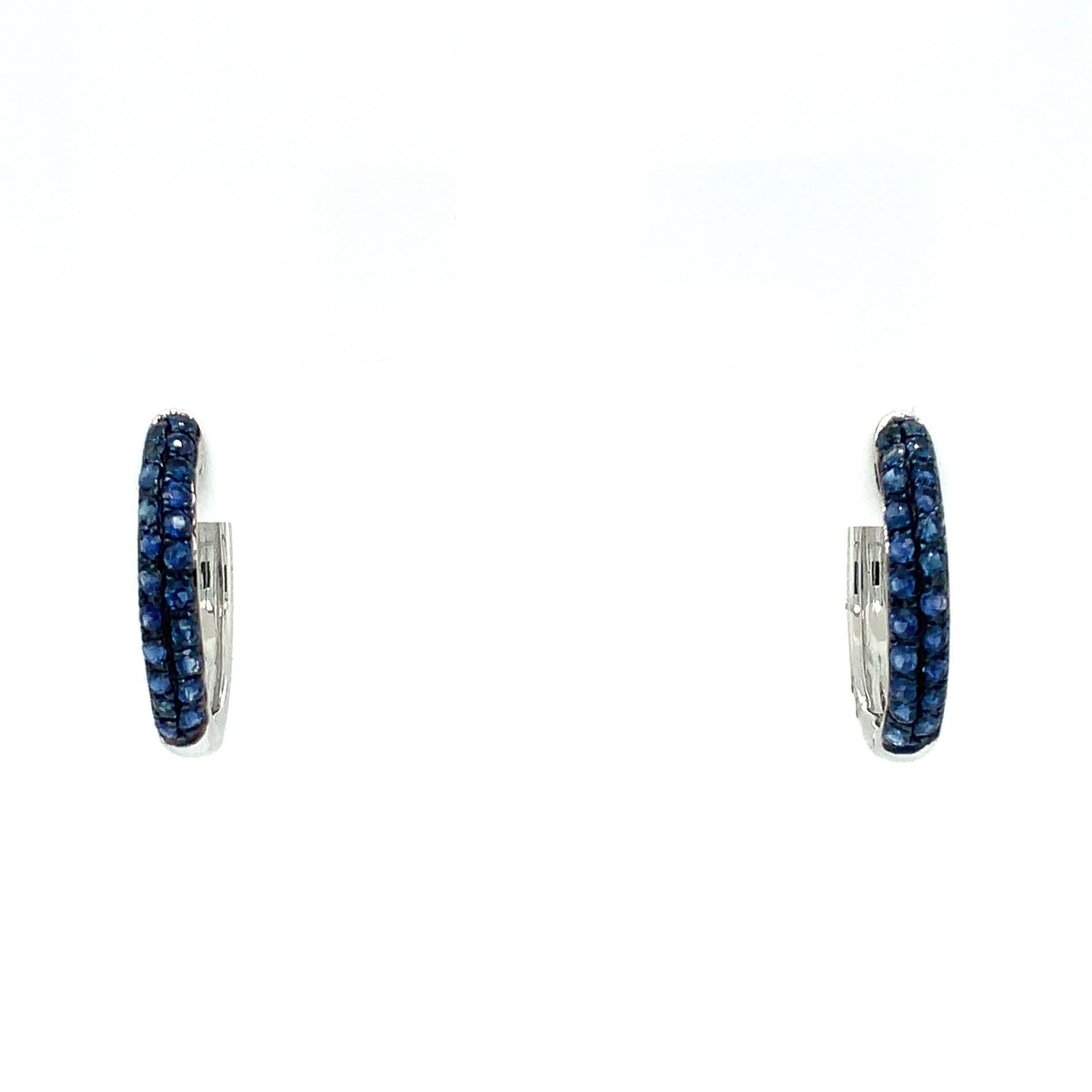 Afarin Collection Pavé Blue Sapphire Huggies Earrings set in 18K White Gold and Black Rhodium Finished. These Vibrant Blue Sapphires are stunning and make a great foundation to hang your favorite drop on!
42 Round Brilliant Cut Natural Blue