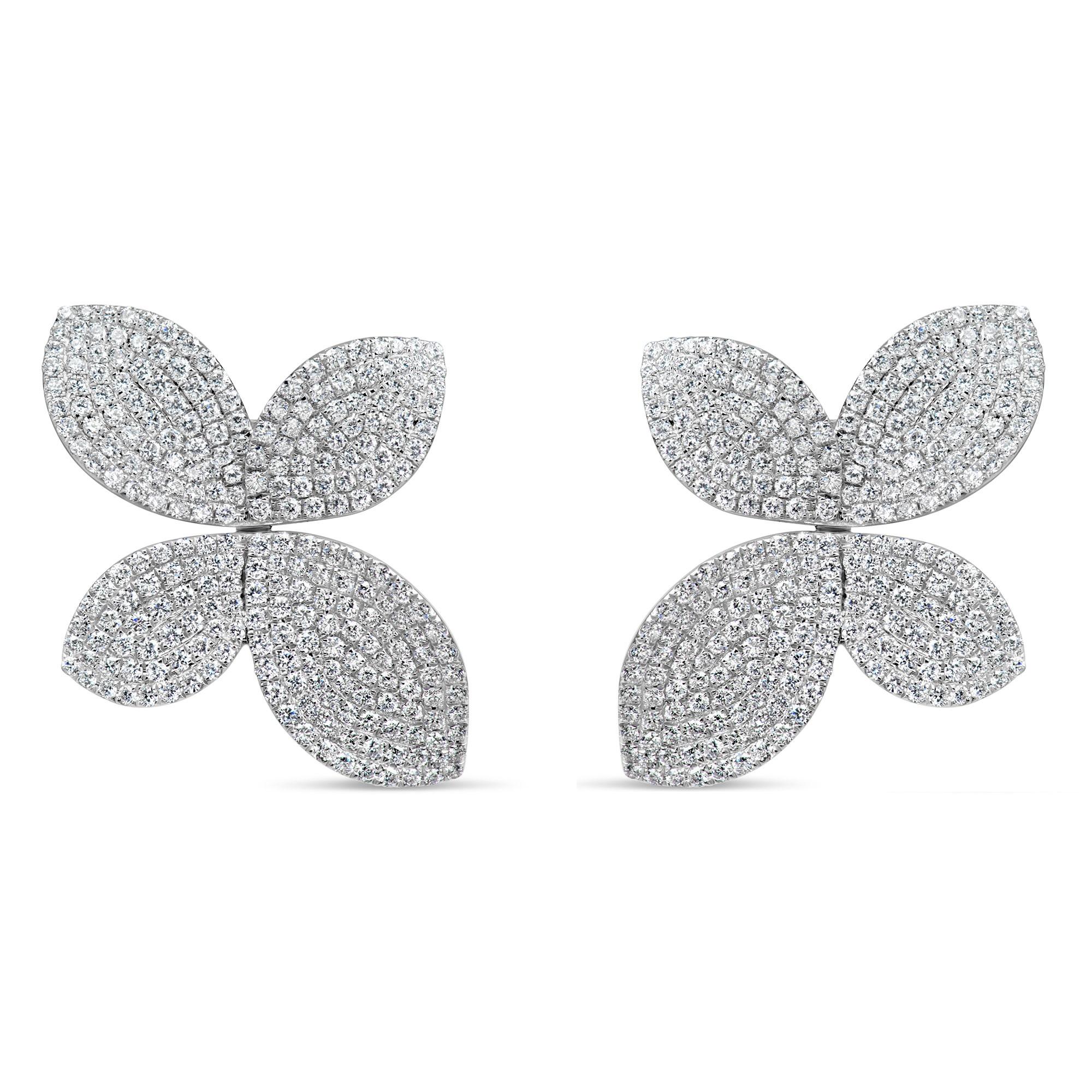 This Afarin Collection Pavé Garden Earrings Set boasts 18 kt White Gold and diamonds, imparting a timelessly elegant aesthetic.
This Collection is stunning!
676 Round Brilliant Cut Diamonds 2.78 cts t.w.  
F in Color  VS in Clarity
Excellent Make