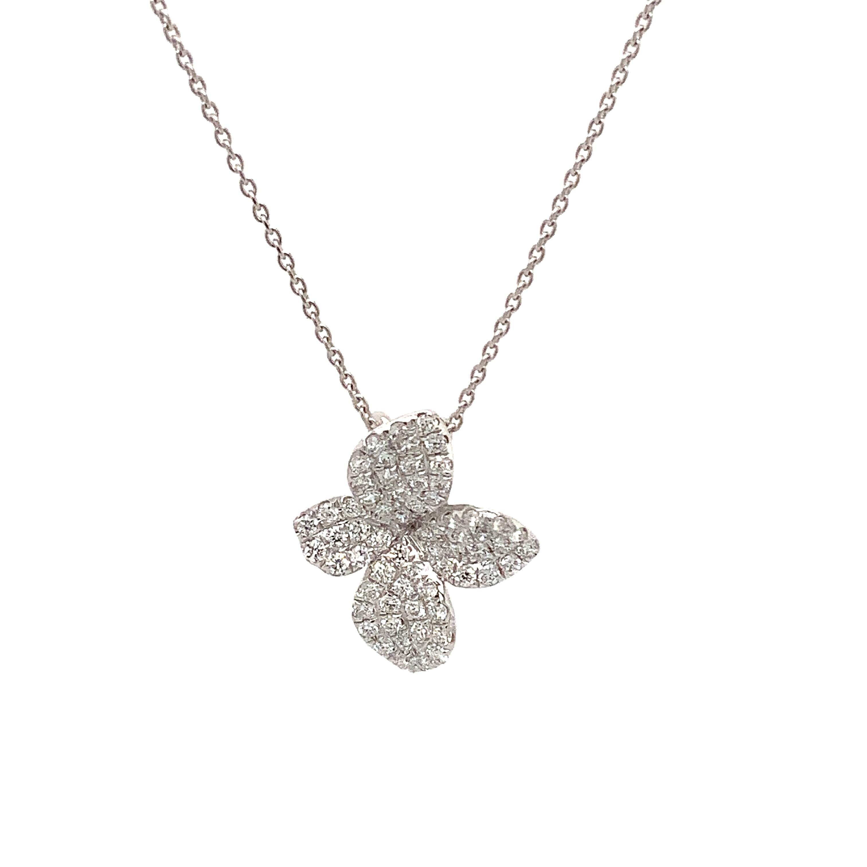 This Afarin Collection Pavé Petite Garden Diamond Pendant comes in 18 kt White Gold and contains 0.43 cts t.w. Brilliant Cut Rounds with F in Color and VS in Clarity, giving off an excellent Make and Polish. It measures 16.5 x 13.2 mm with a 1 mm