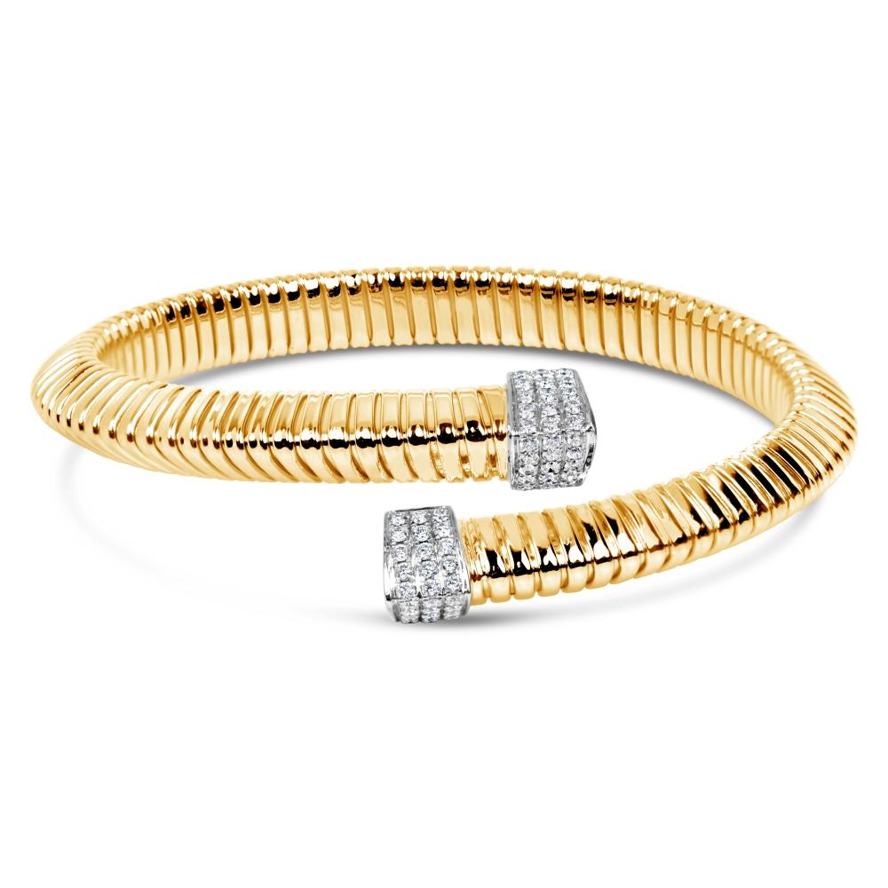 This Afarin Collection piece is made of 18K Yellow and White Gold and features 46 Paved Diamonds at 0.57 cts t.w., presenting F - G Color and VS Clarity. The excellent make and polish of this 8 mm - 5 mm bangle also provide a weight of 14.9 grams.
