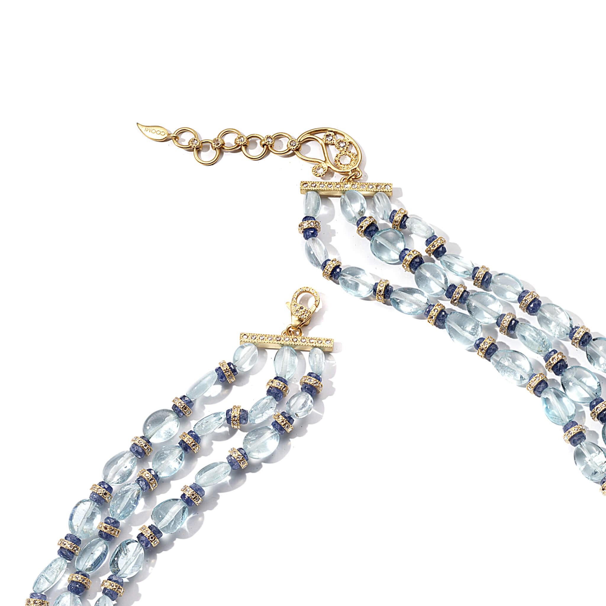 Affinity 16 Inch Necklace with 4.84CTS of Diamonds, 244.08CTS of Aquamarine Tumbled Beads, and 38.72CTS of Blue Sapphire Beads. Set in 20K Gold. Extender available for longer attachment.