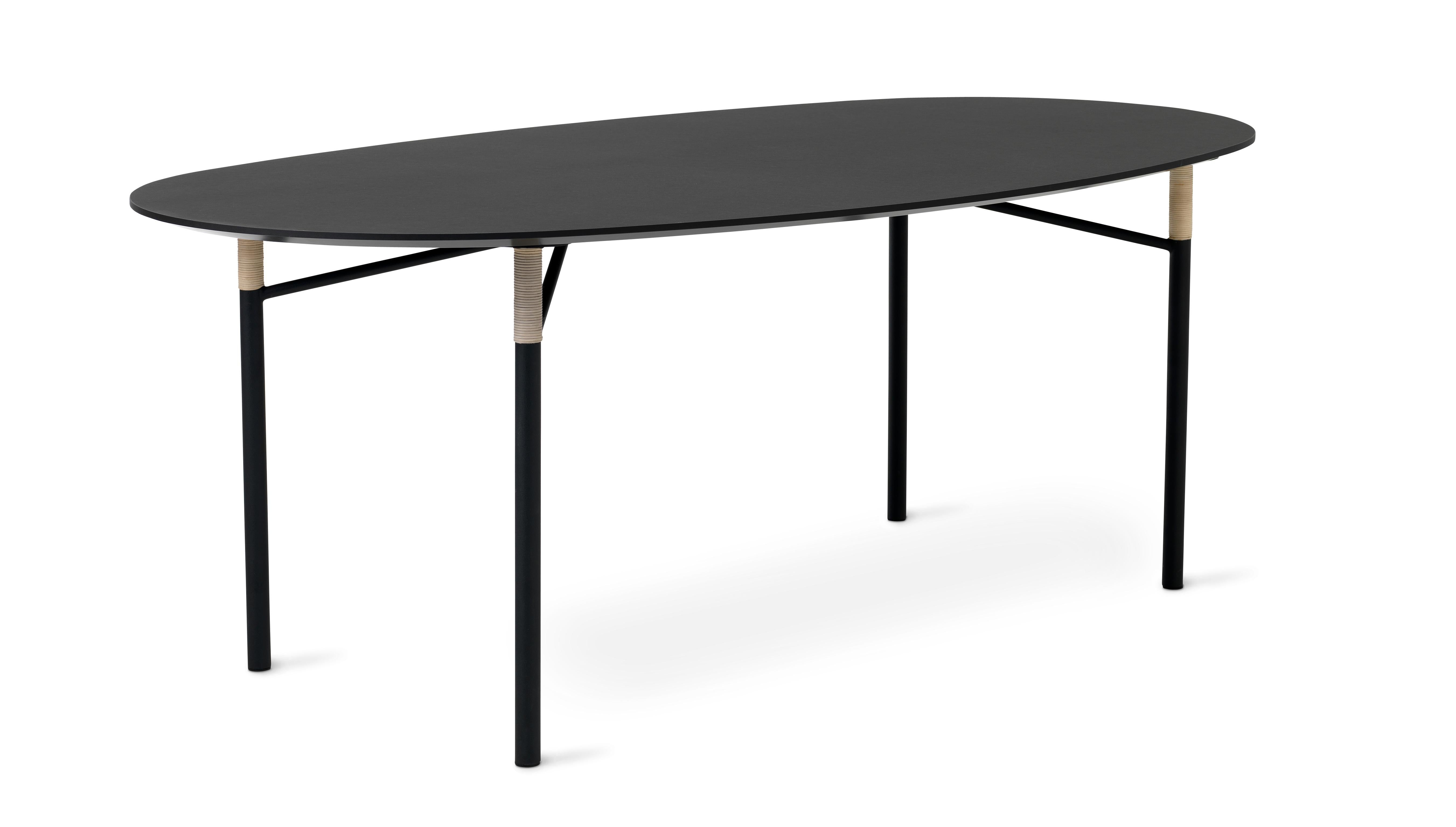 Elegant elliptical dining table with a linoleum top and a warm, relevant design. The elliptical shape creates a lovely sense of connectedness, encouraging conversation and togetherness when family and friends gather round the table for a meal or to