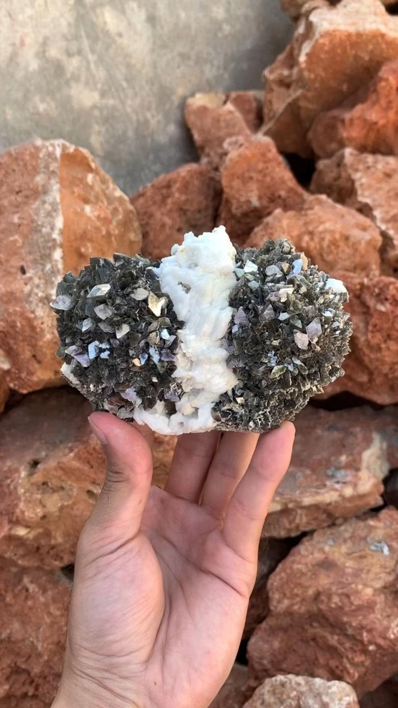 Dim: H: 9.1 x W: 13.4 x D: 6.3 cm 

Wt: 643 g

Specimen Type: Gorgeous glittery Muscovite Mica crystal bunch on Cleavelandite 

Color: Silver-gray 

Treatment: None 



Presenting this attractive and impressive large cabinet size specimen of