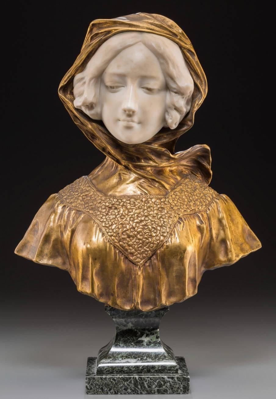 Affortunato Gory (Italian, fl. 1895-1925), 

Total Height: 20.6 Inches (52.5 cm) with Base

Inscribed to shoulder: A. Gory, Paris

Affortunato Gor (Italian, fl. 1895-1925), Bust of a Young Beauty, carved white marble and gilt bronze sculpture,