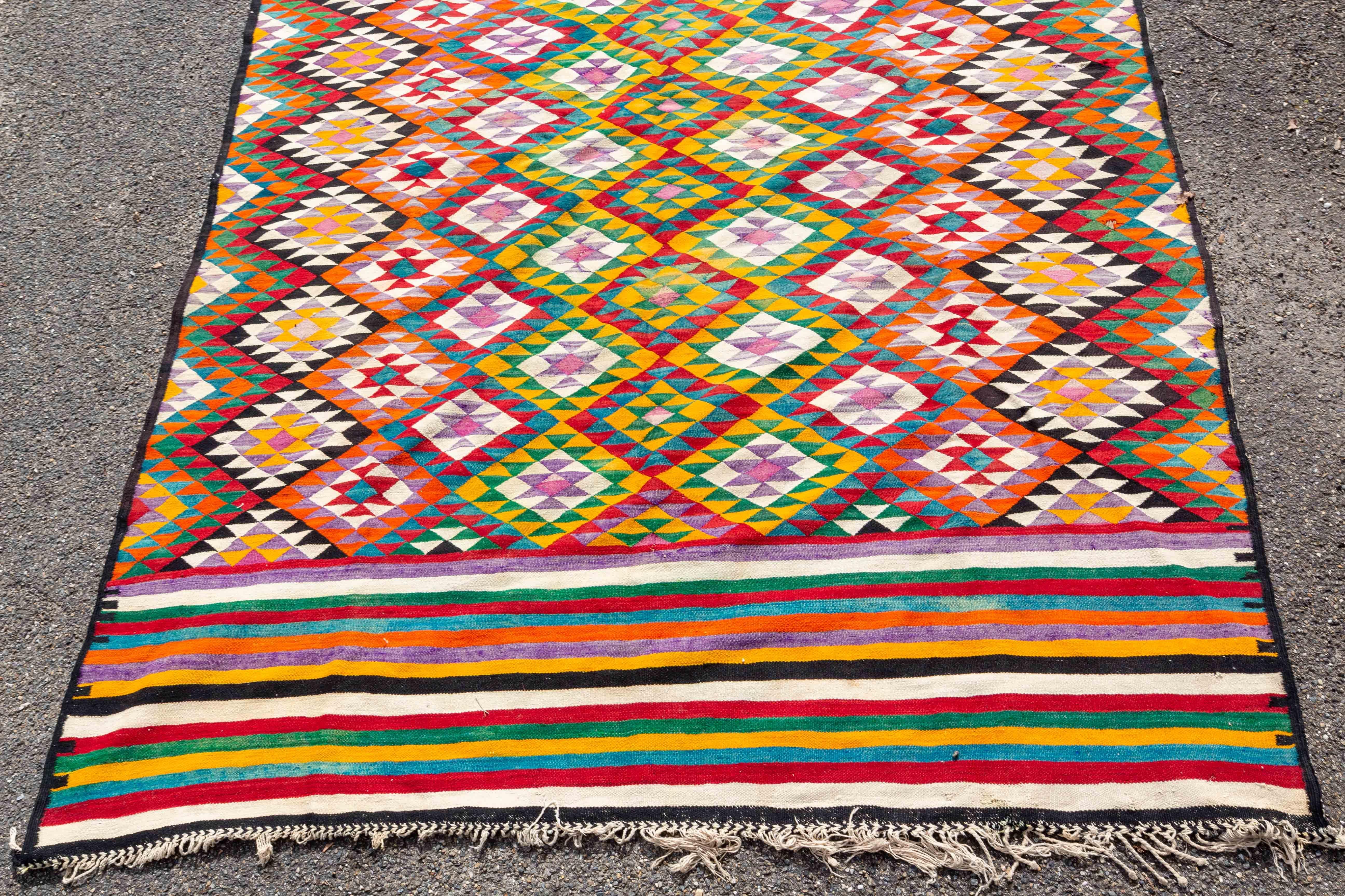 Afgan Kilim Carpet Multicolor and Geometric Patterns, circa 1950 In Fair Condition For Sale In Labrit, Landes