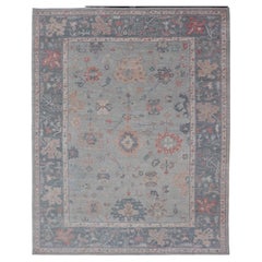 All-Over Floral Oushak with Light Blue Background and Dark Gray Border