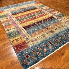 Serapi Rug Gallery’s 4'3"x6'1" Hand-Knotted Wool Gabbeh Tribal Area Rug